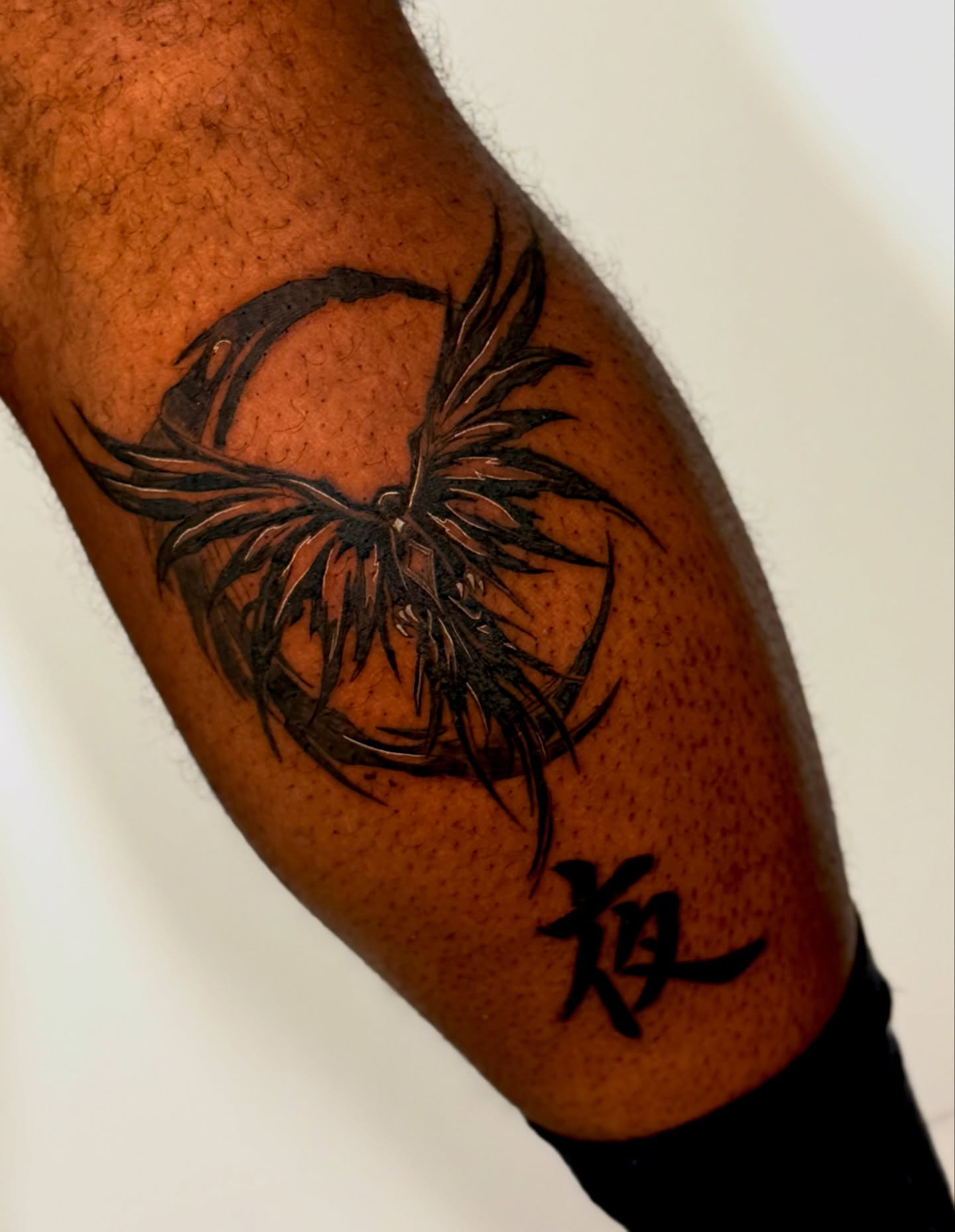 Bird tribal tattoo on the forearm by Orca