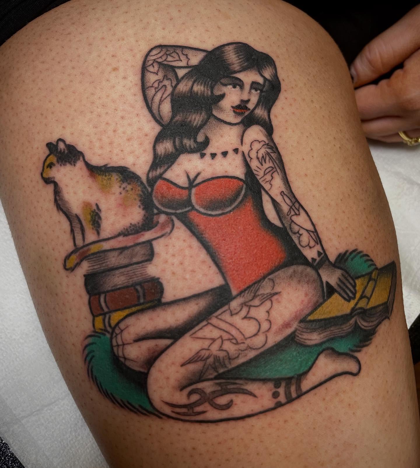 Mermaid with cat American traditional tattoo on the thigh by Micheal McGlinchey