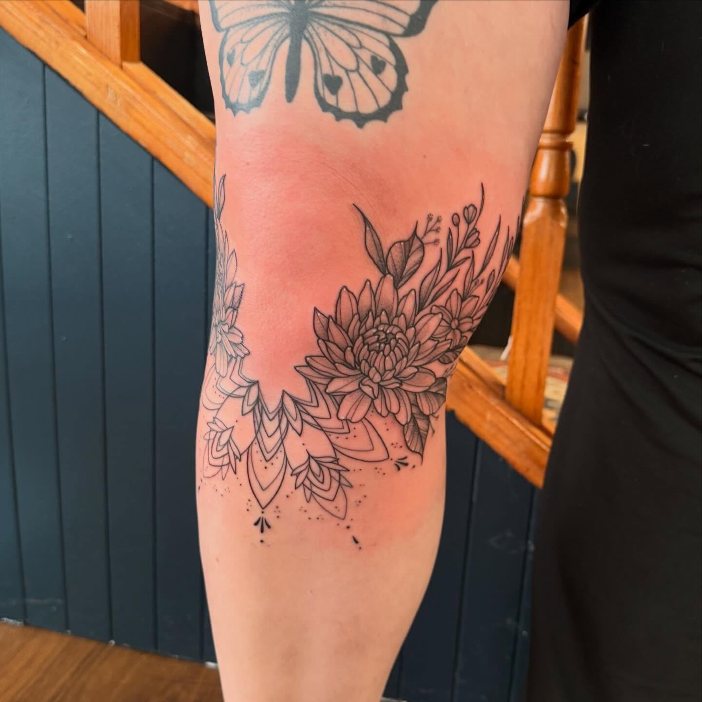 Floral bouquet dotwork tattoo on the calf by Erica Rose π€