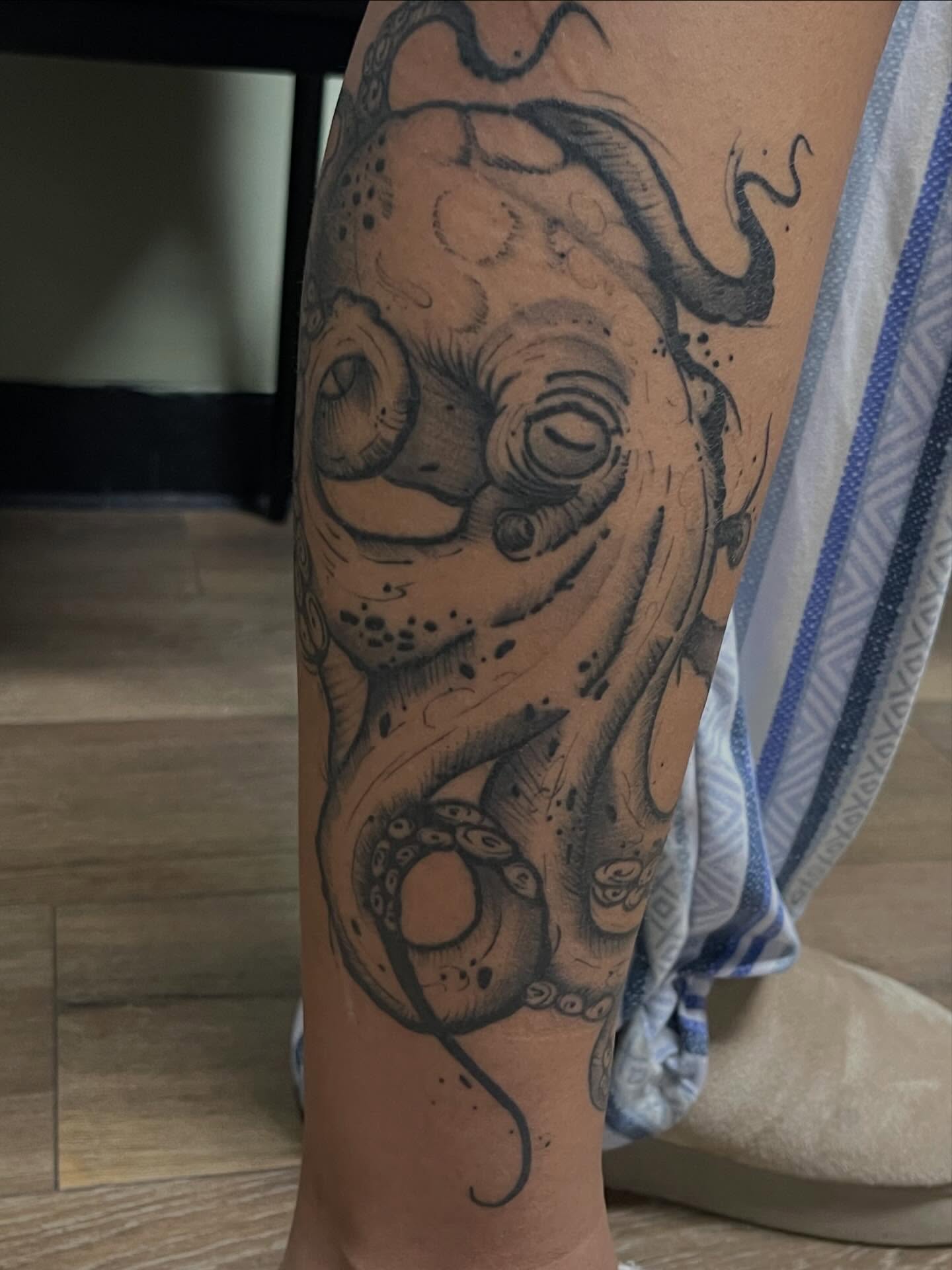 Octopus black and grey tattoo on the forearm by Tina Gregg, North Ridgeville, Ohio