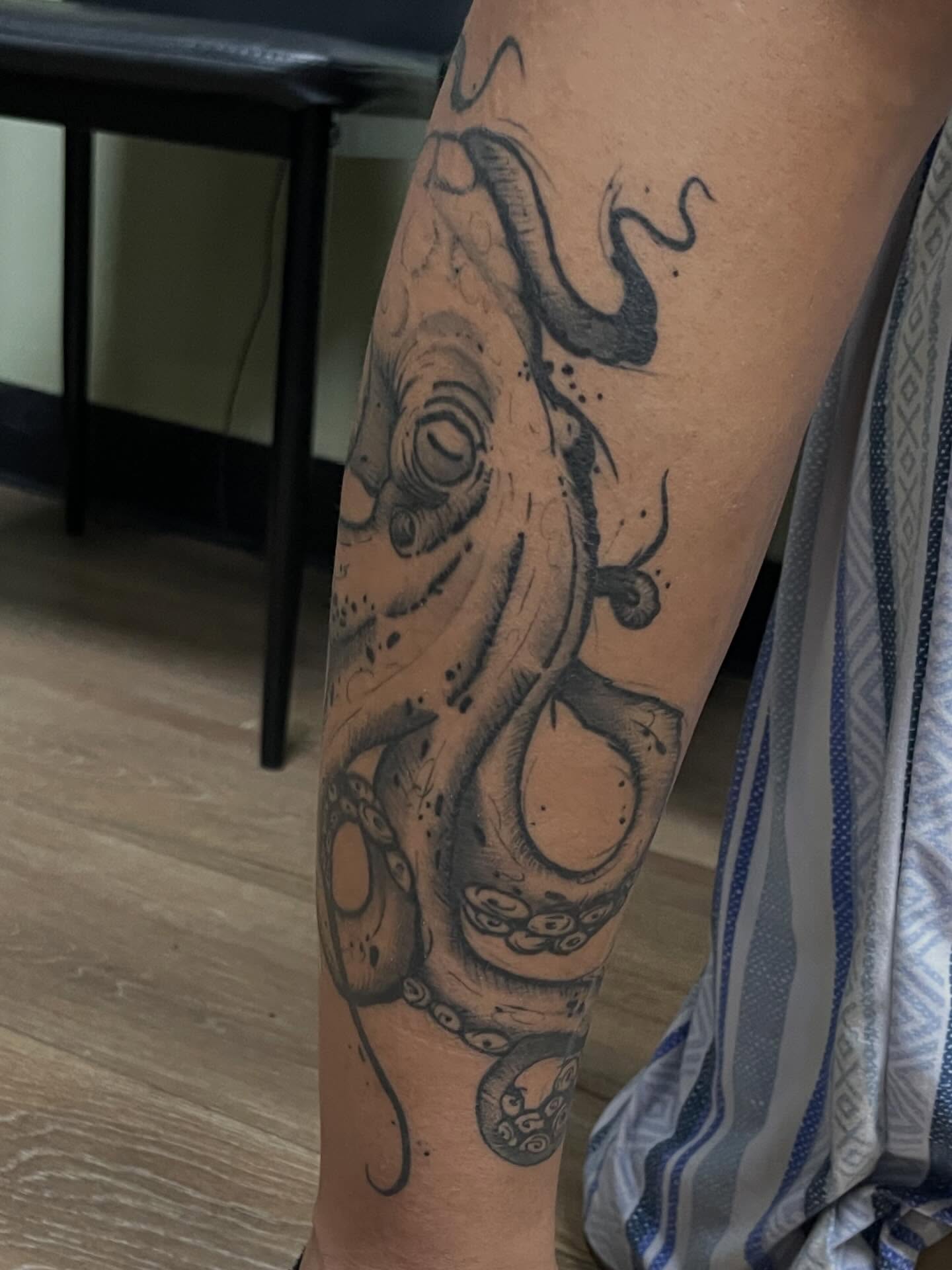 Octopus black and grey tattoo on the forearm by Tina Gregg, North Ridgeville, Ohio