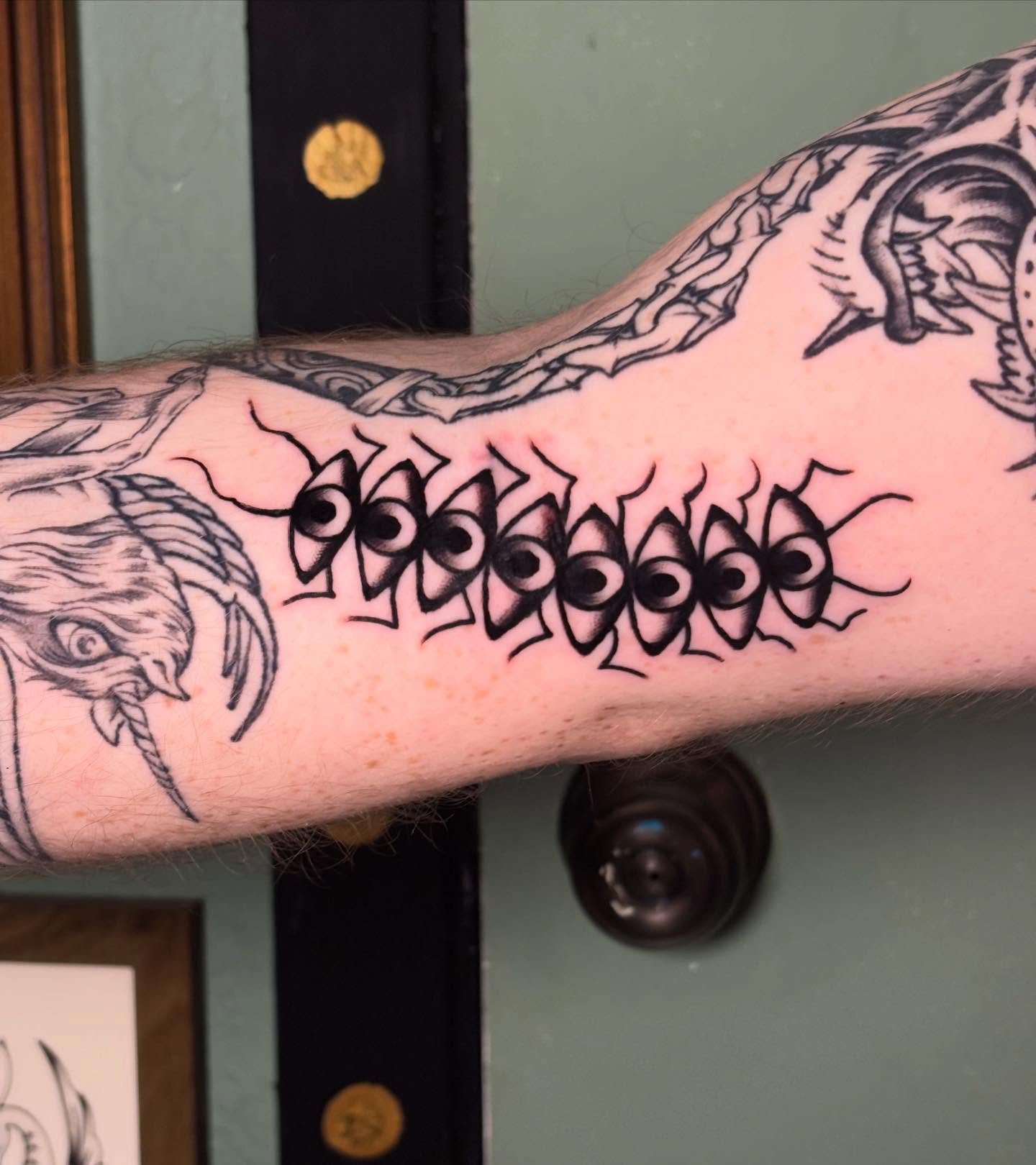 Eyes black and grey tattoo on the forearm by ☻︎ Cyd Precious ☹︎