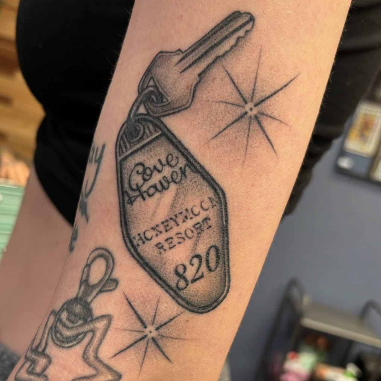 Keychain dotwork tattoo on the forearm by Storm