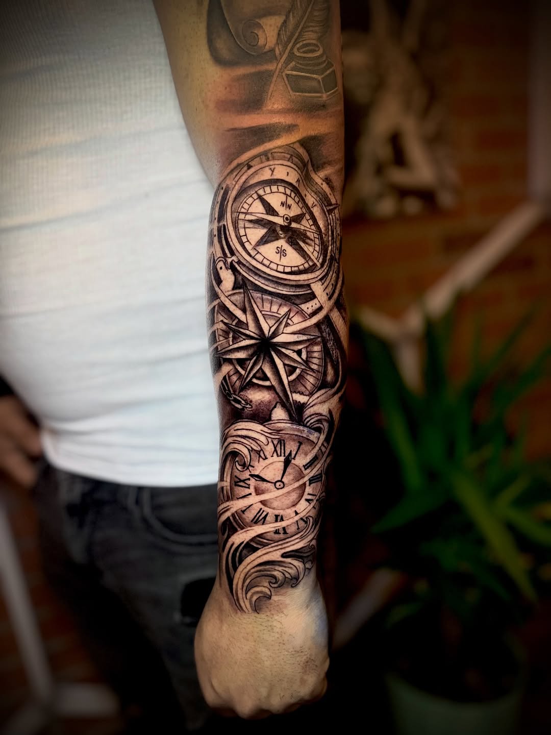 Compass and clock realism tattoo on the forearm by Andres Calvo🇺🇸🇨🇴
