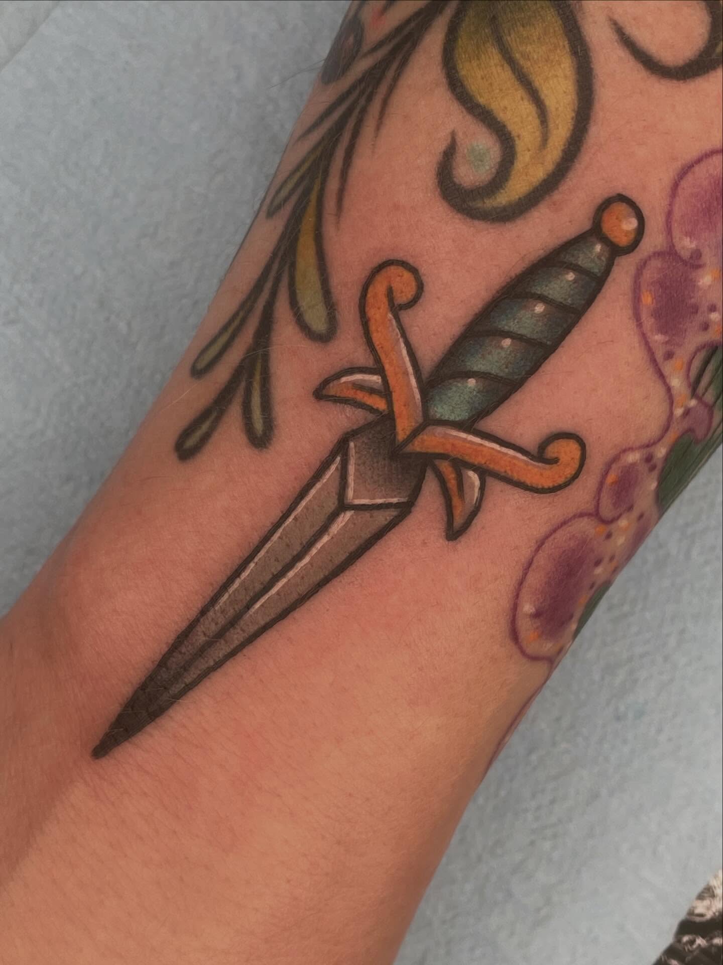 Sword American traditional tattoo on the forearm by Beeker, Bellingham, Washington