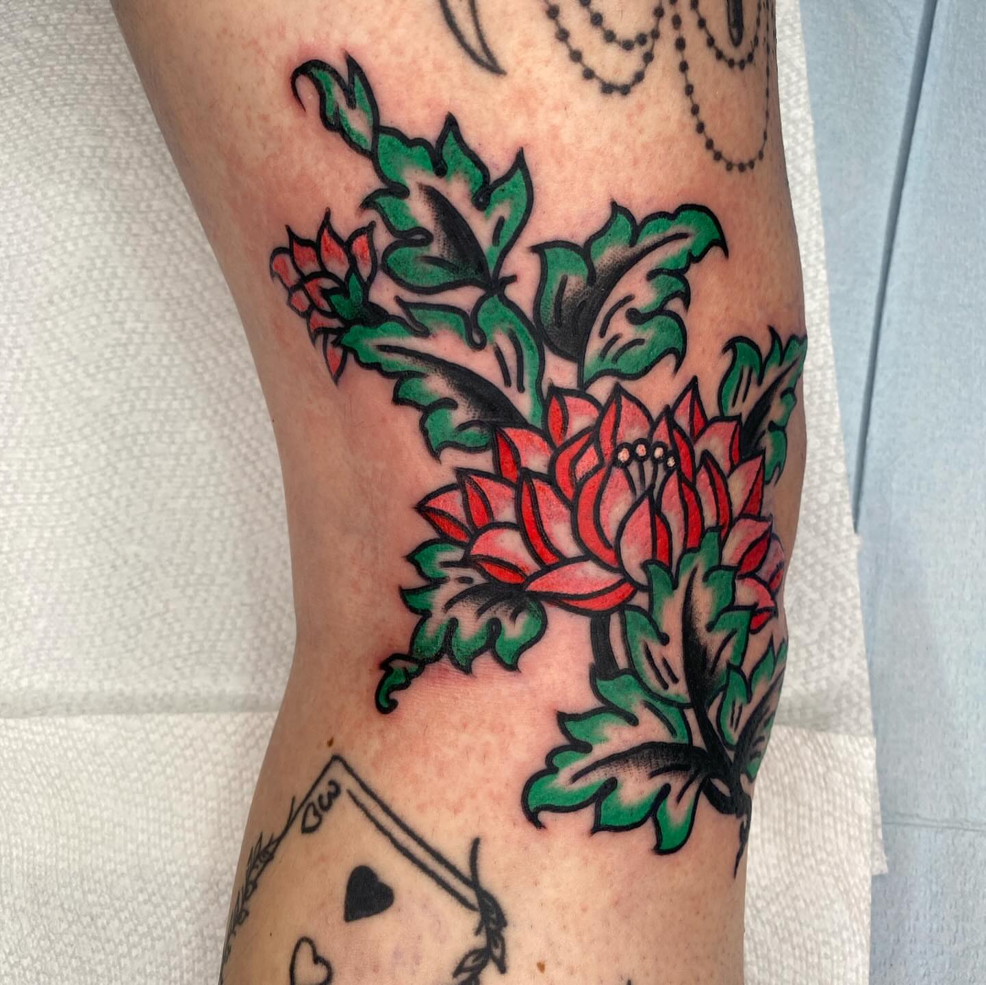 Lotus flower American traditional tattoo on the forearm by Jack, Knoxville, Tennessee
