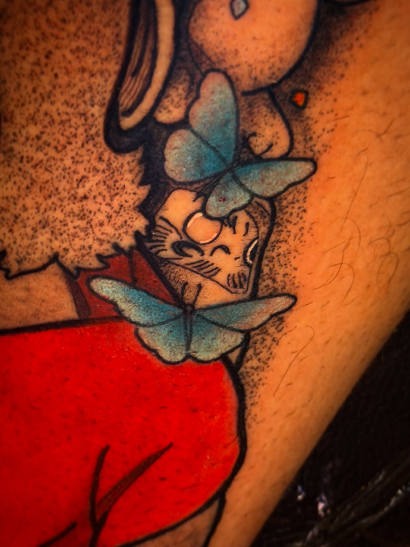 Bunny with butterflies American traditional tattoo on the thigh by Aiden Madrigal