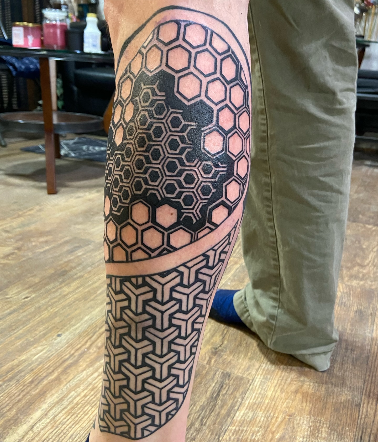 Tattoo by @theblackdottattoo — geometric