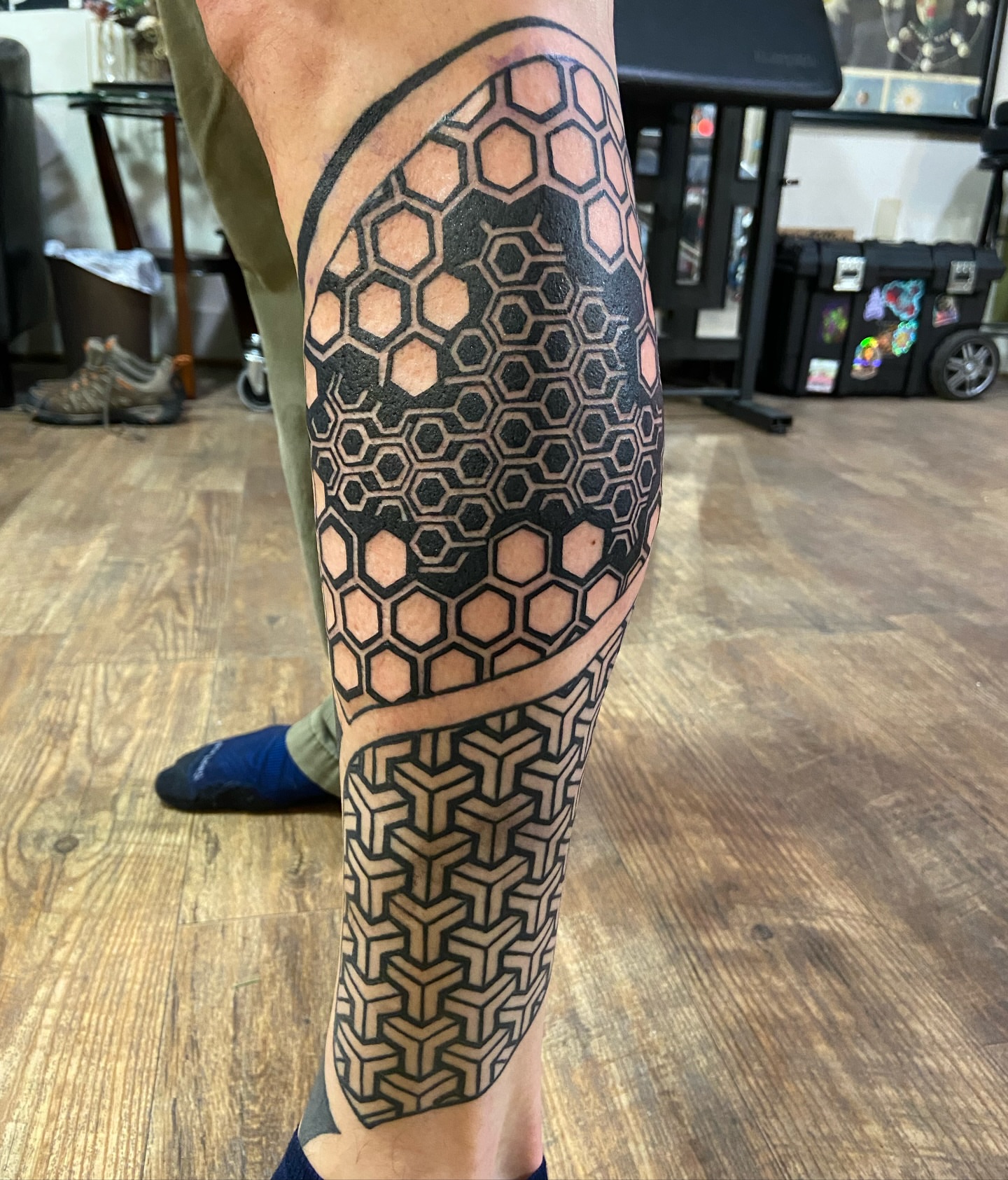 Tattoo by @theblackdottattoo — geometric