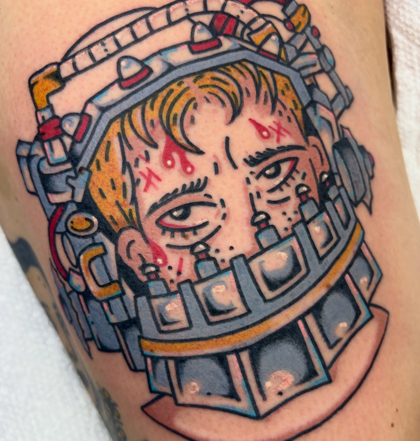 Astronaut helmet American traditional tattoo on the forearm by Bella
