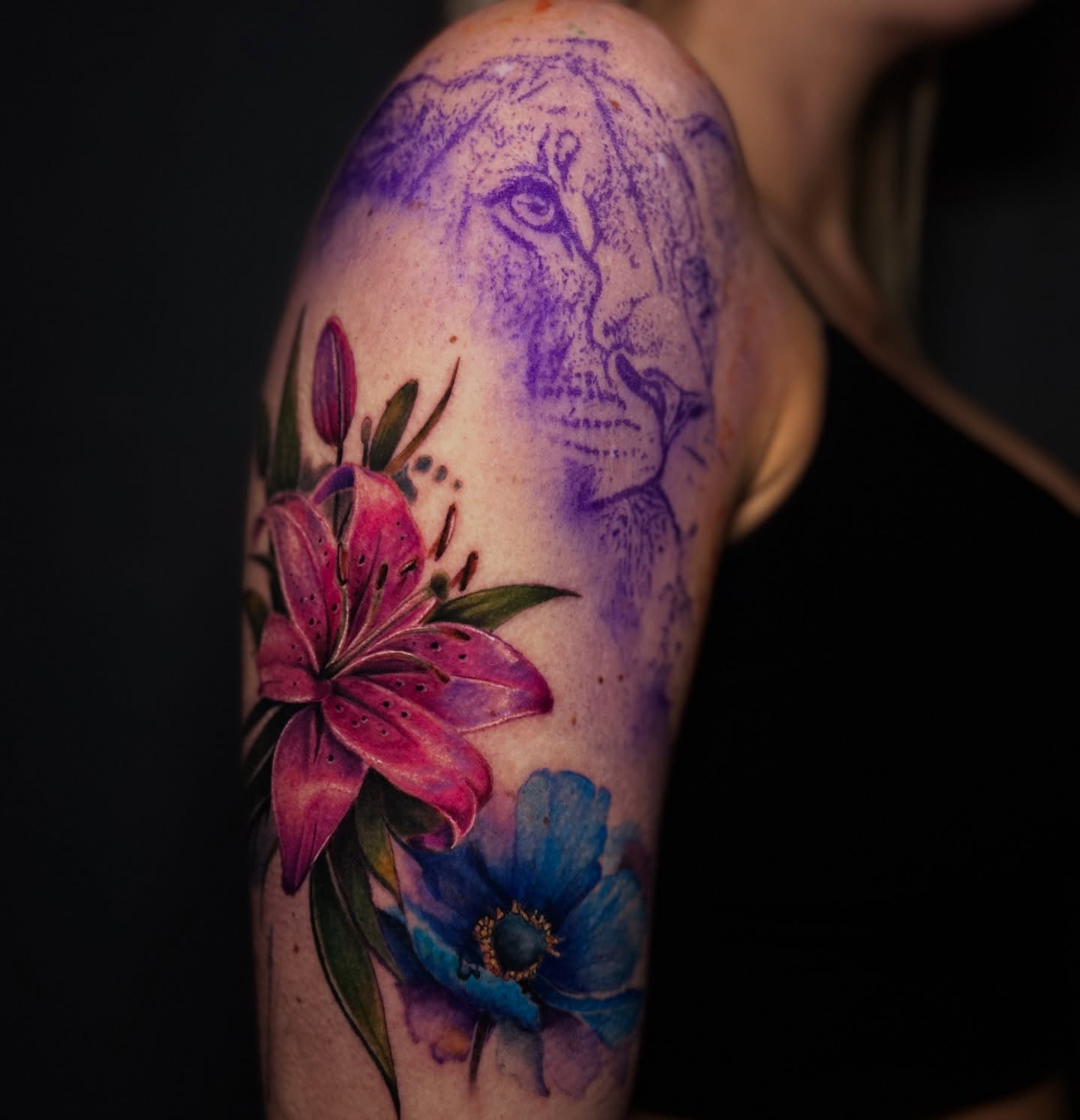 Lion and flowers dotwork tattoo on the shoulder by Austin Tattoo Artist