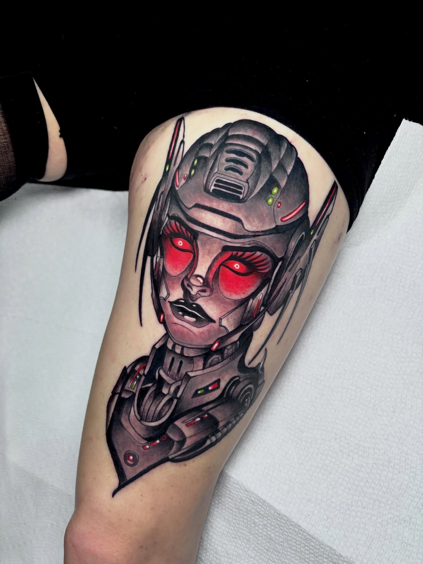 Cyborg head realism tattoo on the thigh by Shane Klos