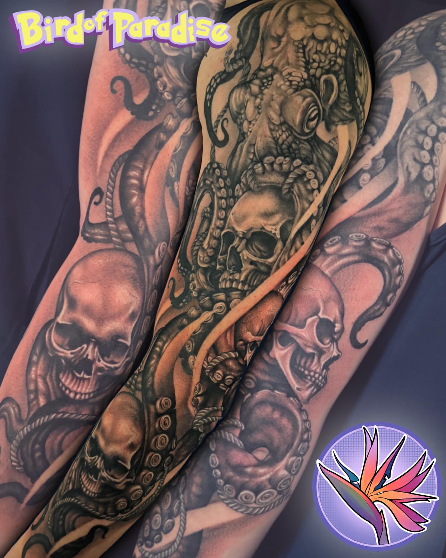 Octopus and skulls dark realism tattoo on the forearm by Jade Lewis