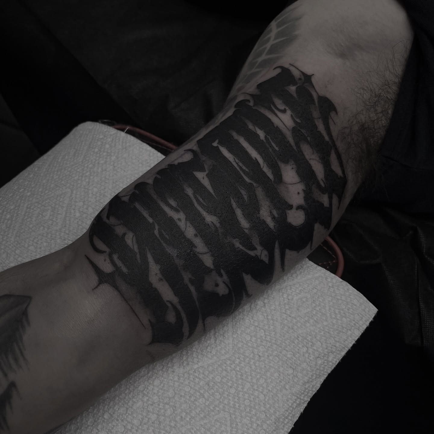 Script lettering lettering script tattoo on the forearm by suzie