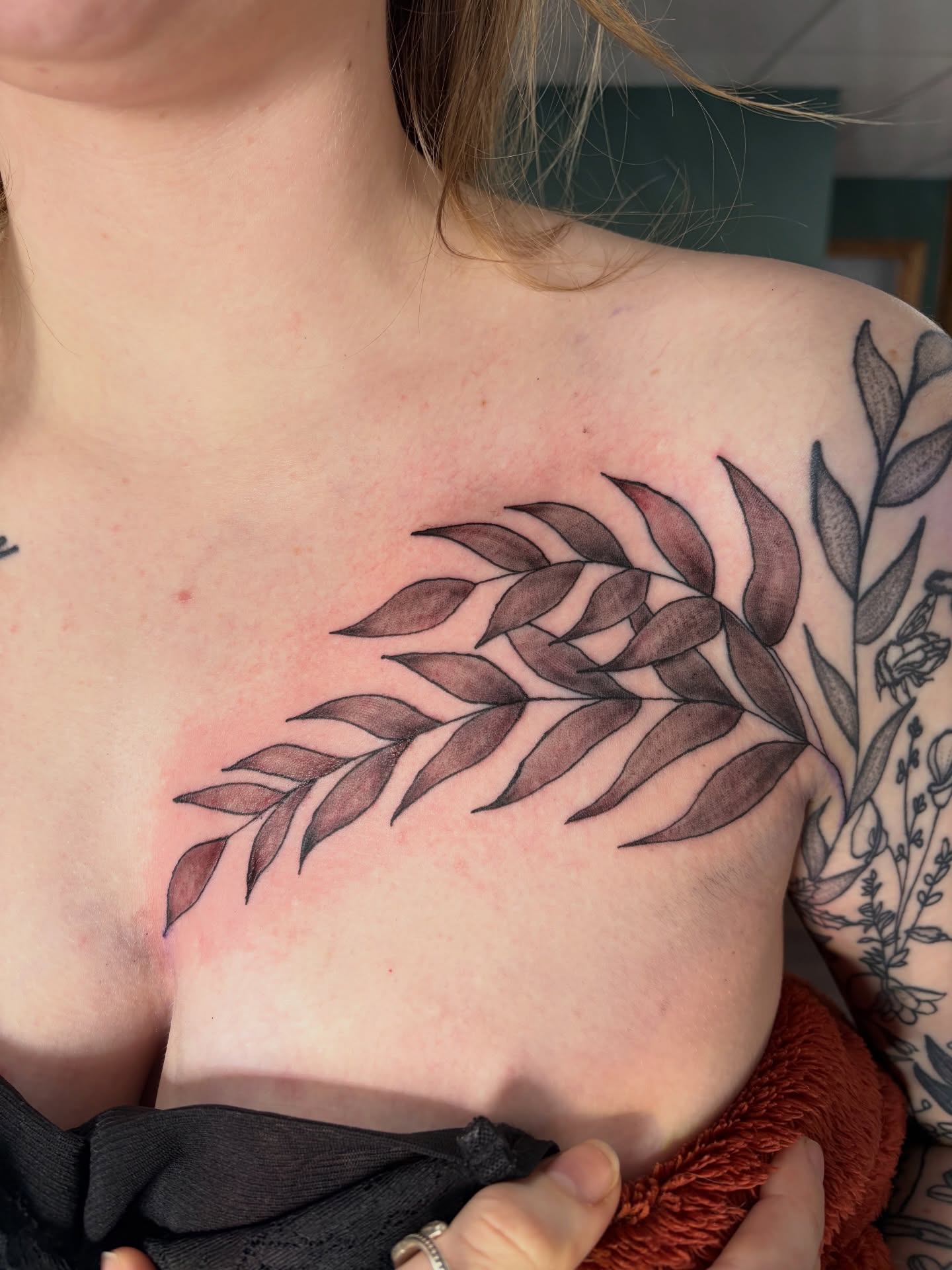 Branch black and grey tattoo on the chest by Michelle