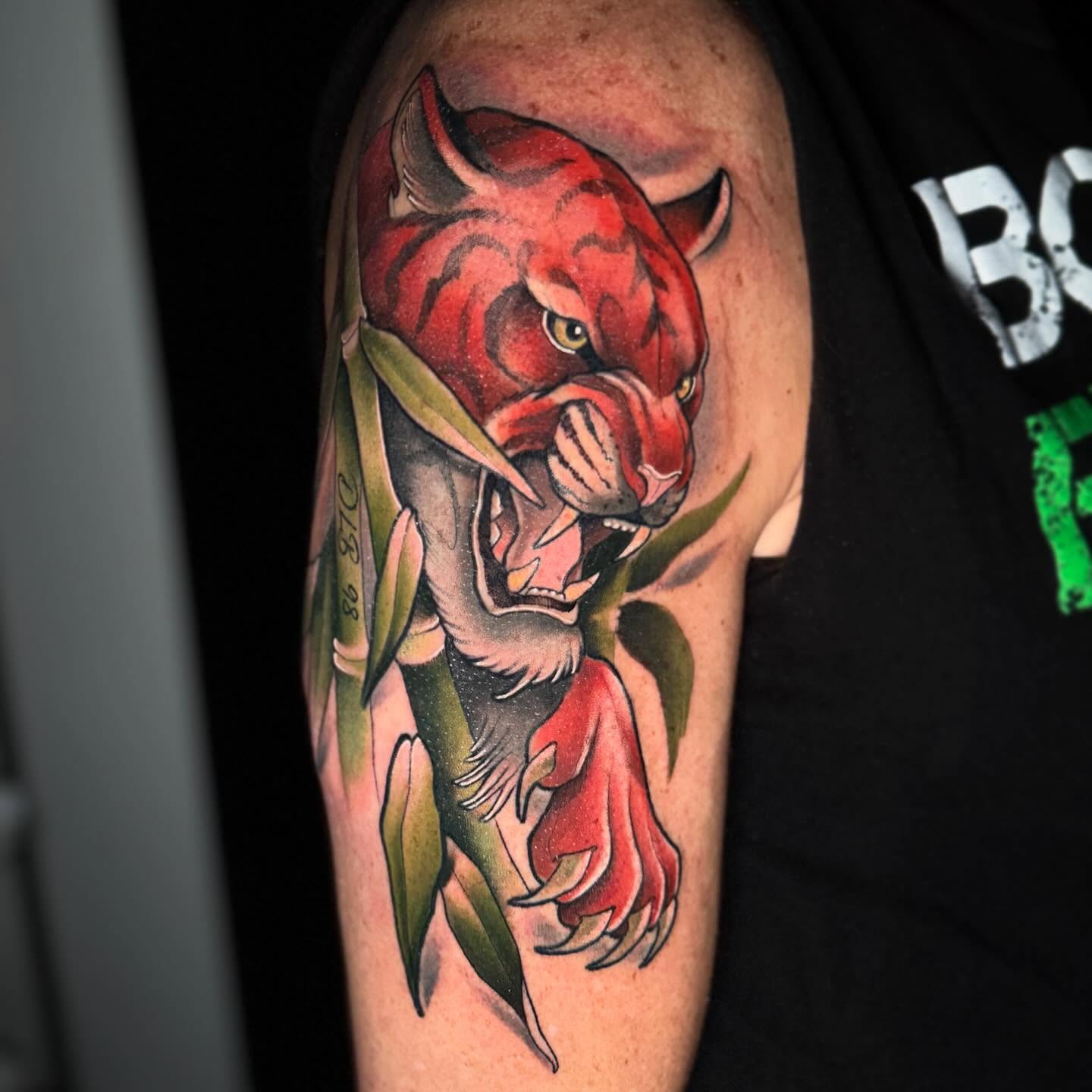 Red panther with rose realism tattoo on the forearm by 🕯Heather🕯