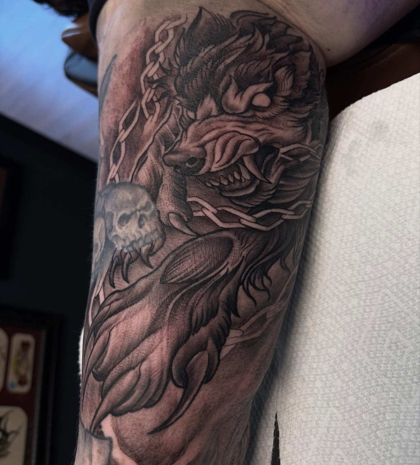 Demon skull dark realism tattoo on the forearm by Kyle Ketzler