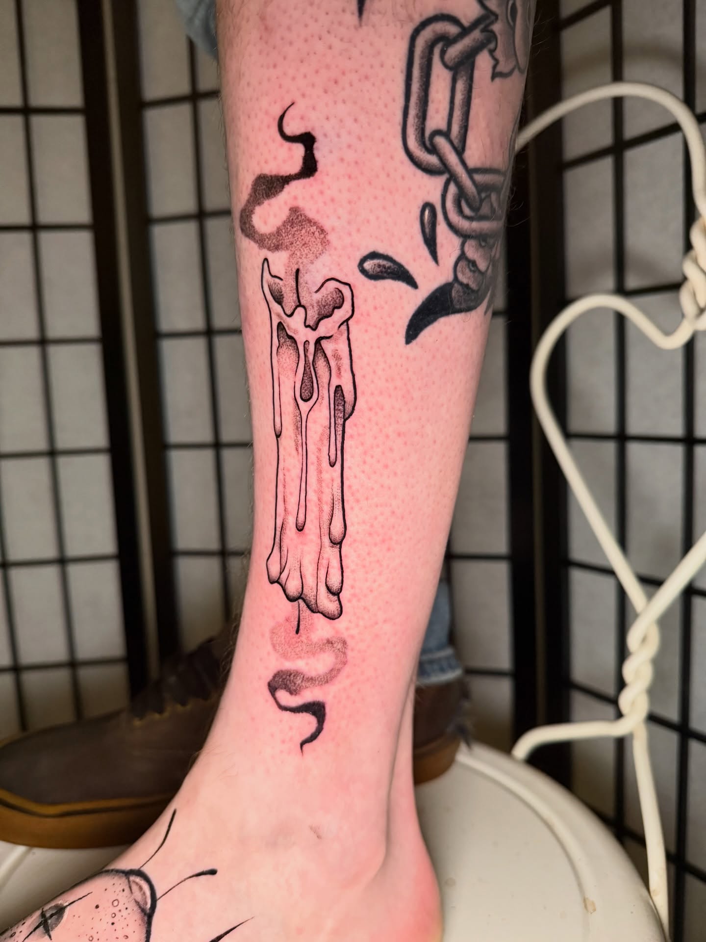 Dripping bone dotwork tattoo on the calf by Austin Poliszuk, Minneapolis, Minnesota