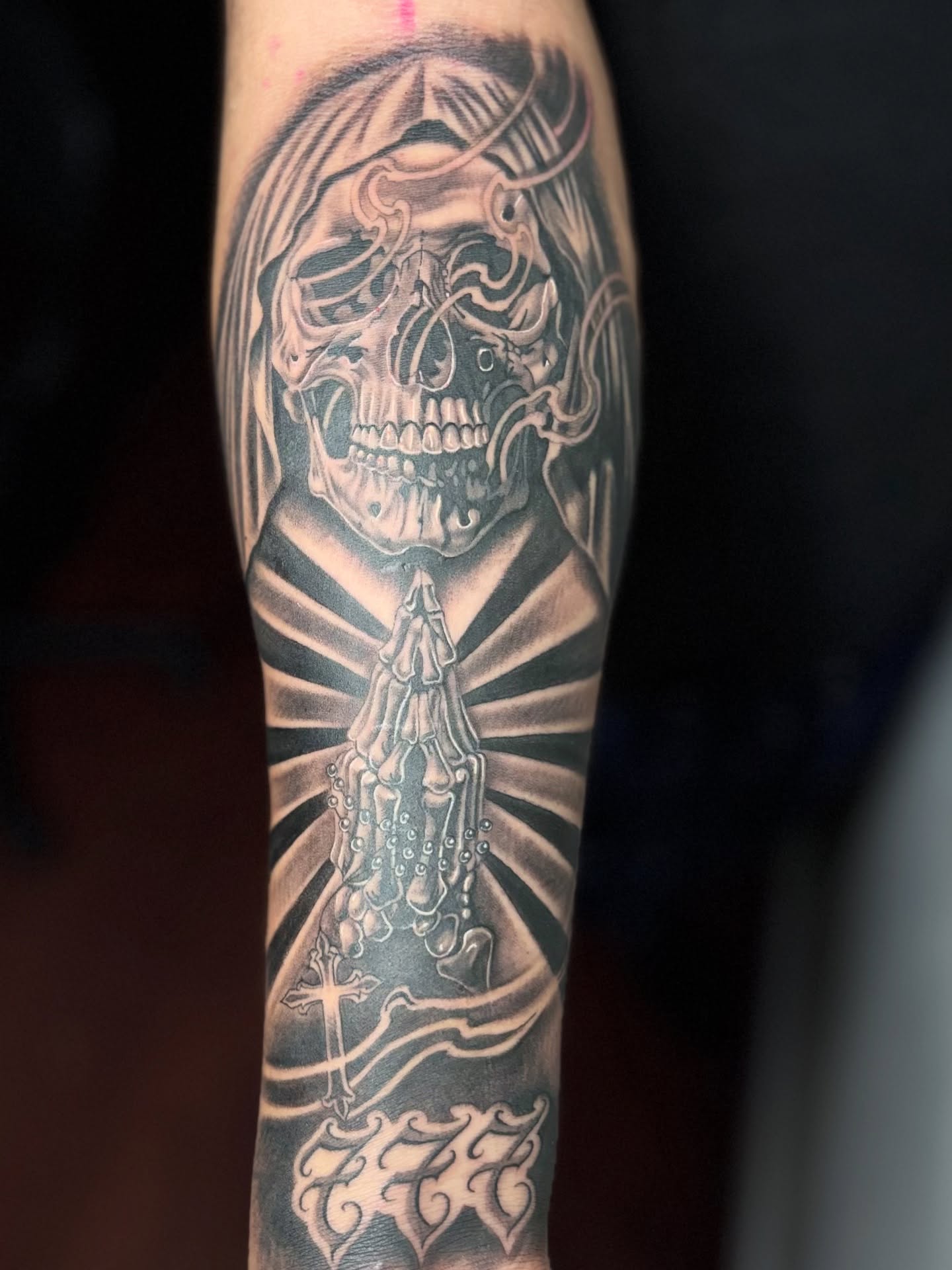 Praying skull realism tattoo on the forearm by @tattoosbyadrian