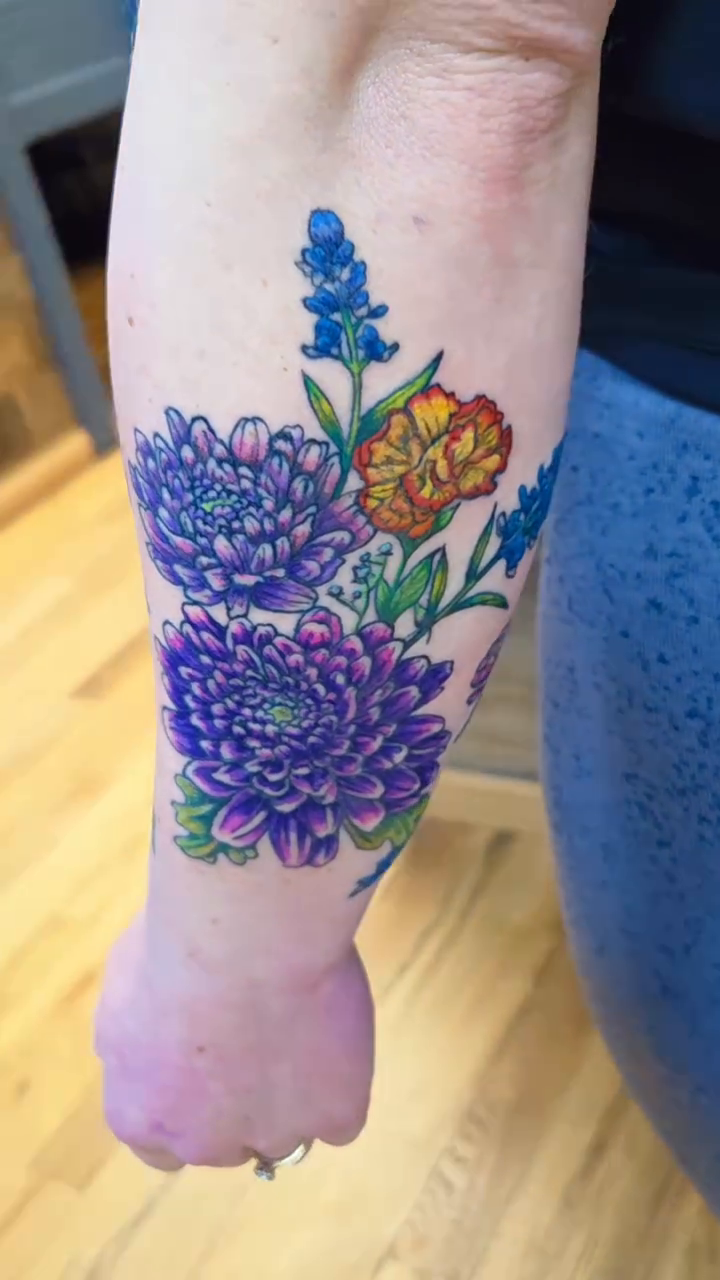 Floral arrangement tattoo neo-traditional tattoo on the forearm by Courtney, Lakewood, Ohio