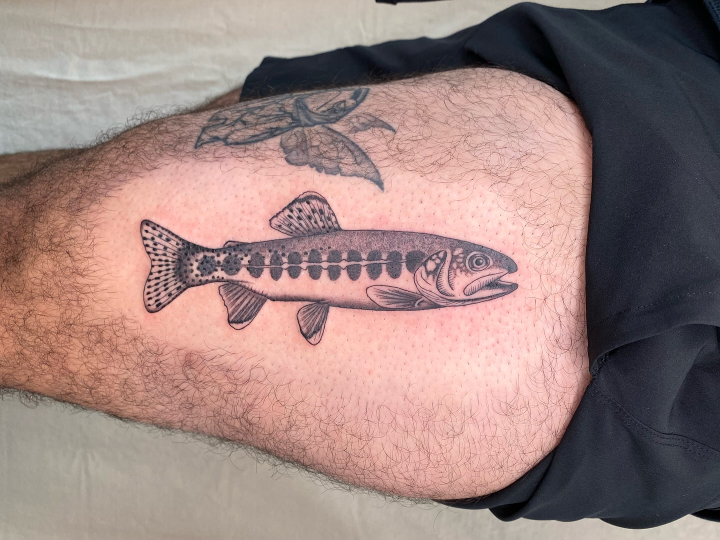 Salmon dotwork tattoo on the thigh by Sasha 🪆 Southern California Tattoo Artist