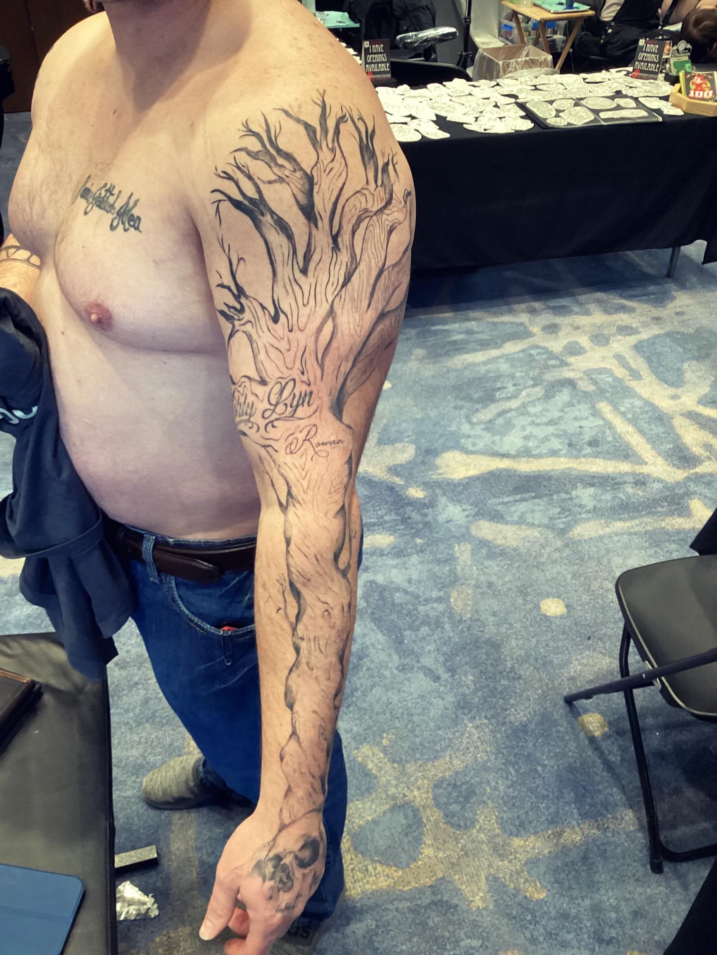 Tree black and grey tattoo on the upper arm by Rell Washington, Marlow Heights, Maryland