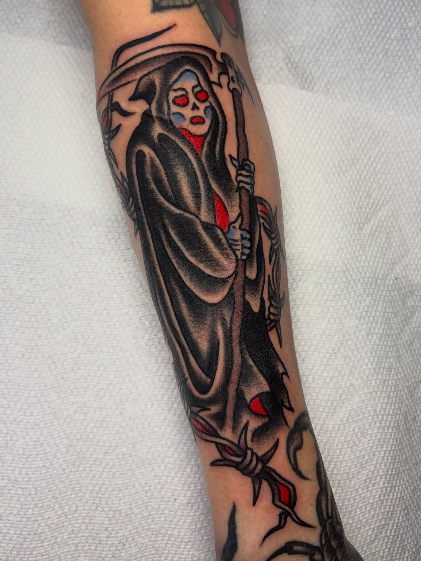 Grim reaper American traditional tattoo on the forearm by David Armacost, Cincinnati, Ohio
