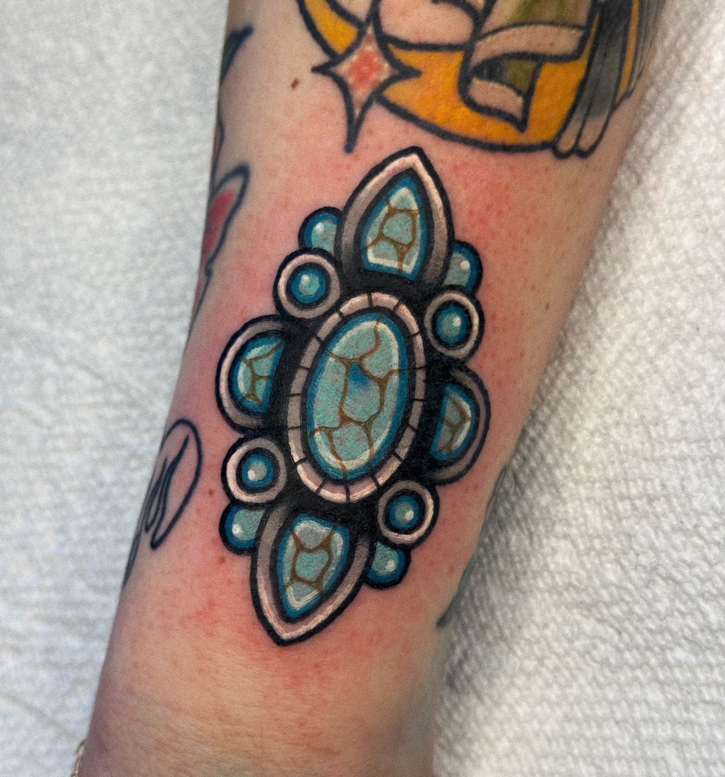 Gemstone cluster American traditional tattoo on the forearm by 𝕷𝖆𝖚𝖗 𝕷𝖆𝖚𝖗
