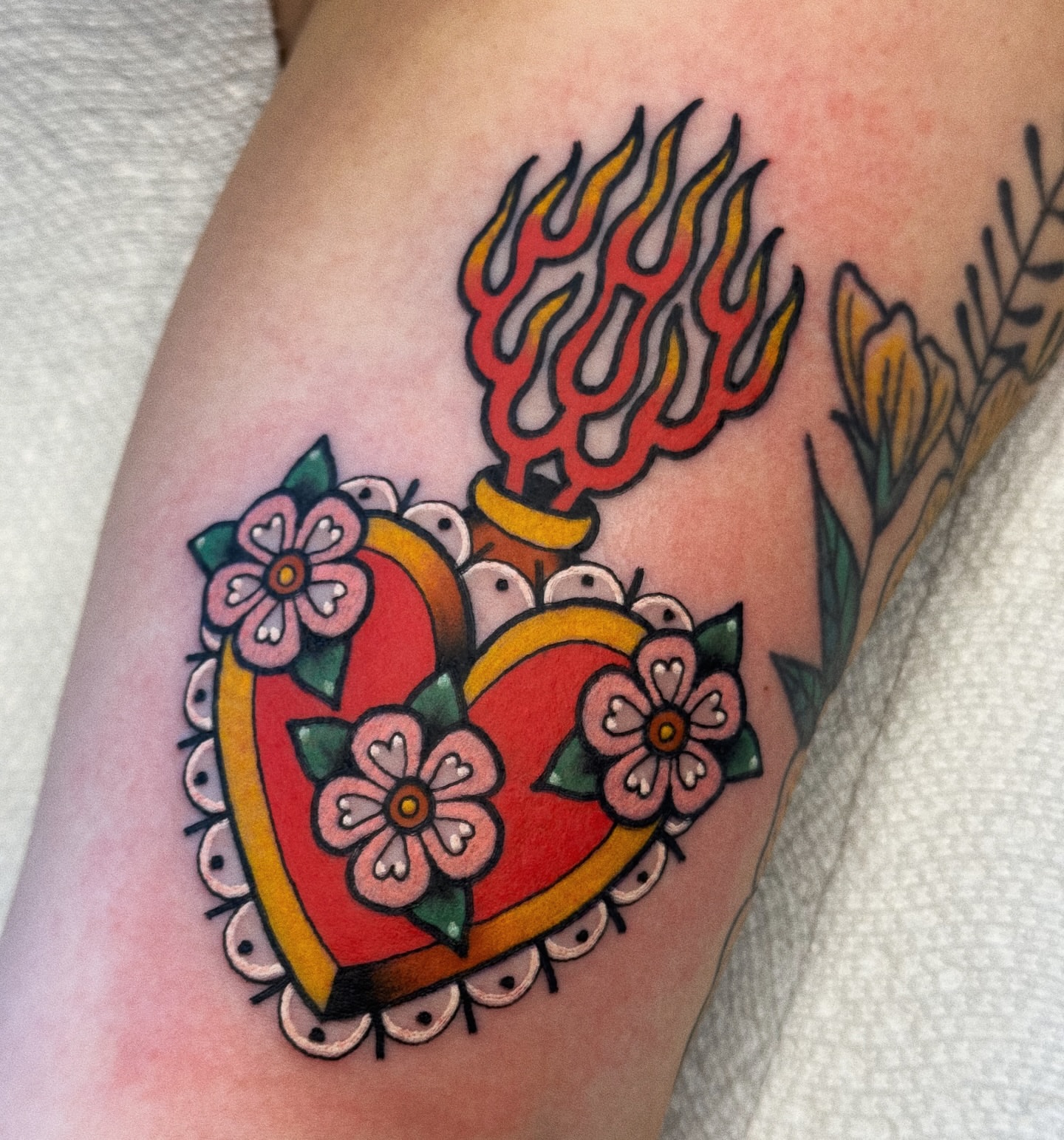 Heart with flames American traditional tattoo on the forearm by 𝕷𝖆𝖚𝖗 𝕷𝖆𝖚𝖗