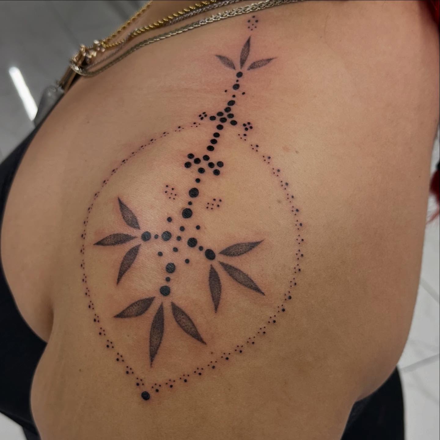 Dotwork cross dotwork tattoo on the shoulder by Kerusha (Bay Area Tattoo Artist)