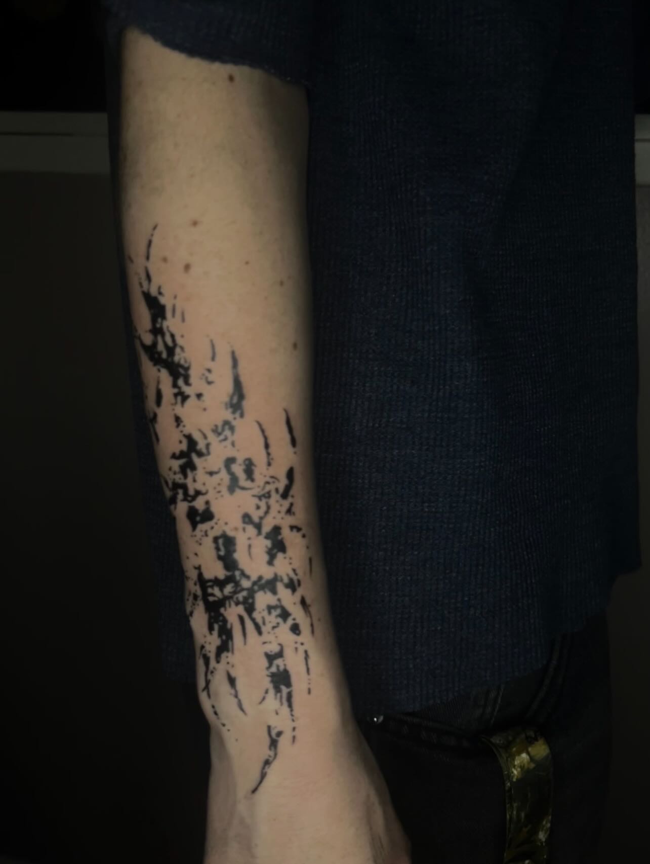 Abstract splatter dotwork tattoo on the forearm by @halfwit__