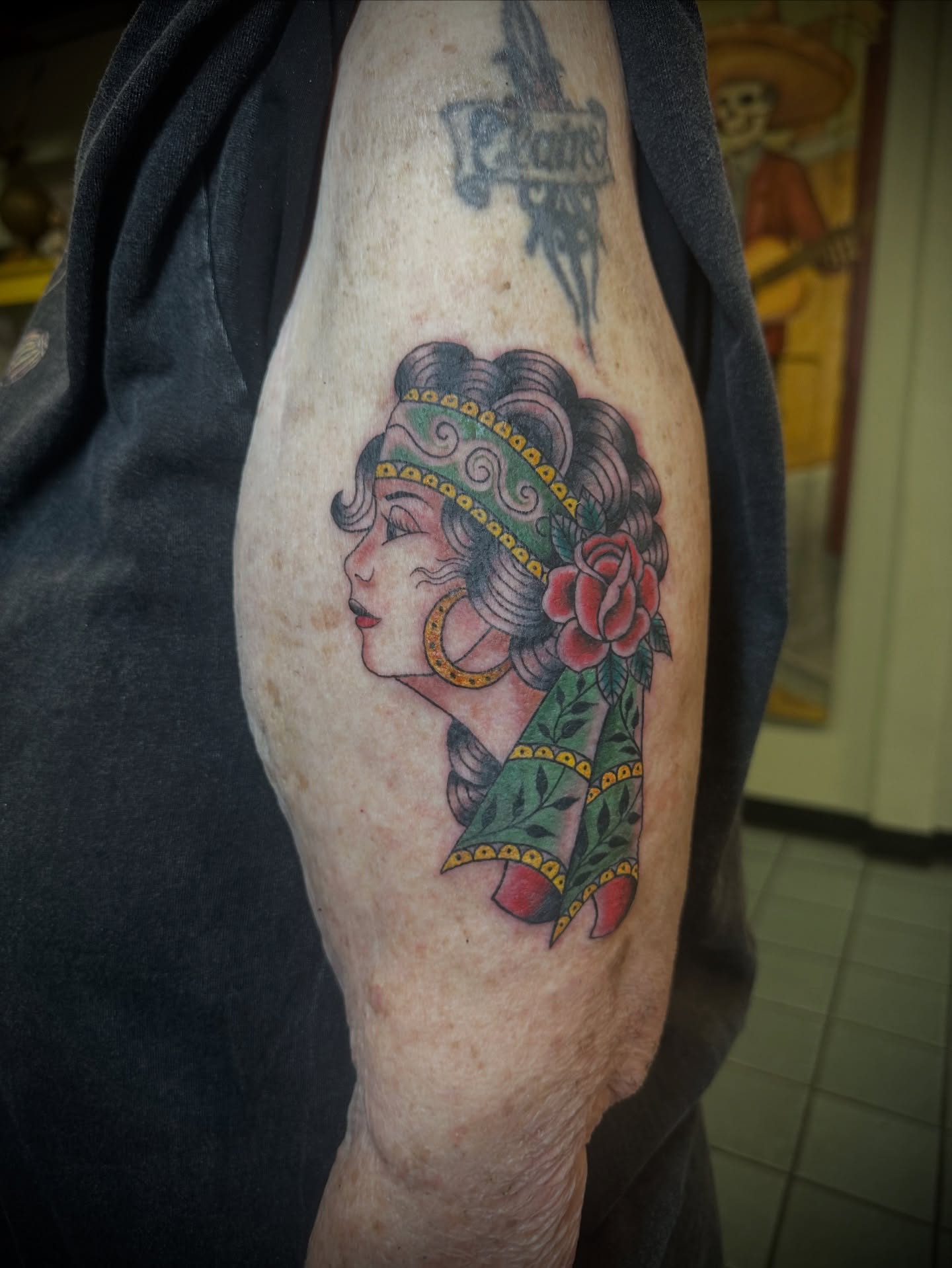 Woman with floral crown American traditional tattoo on the forearm by 🥀Chloe Miller
