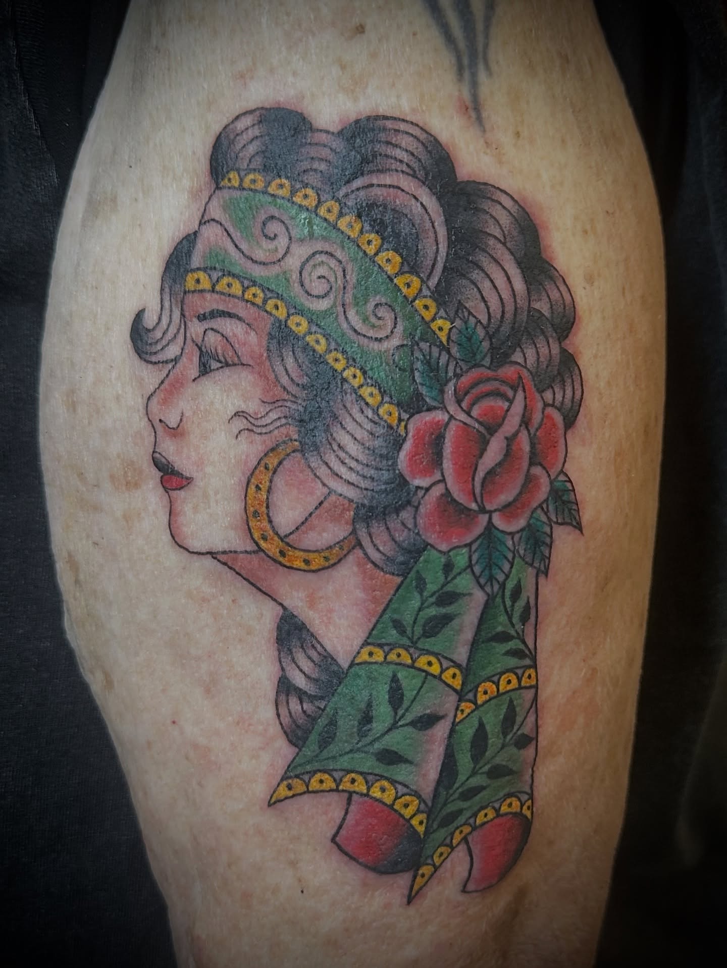 Woman with floral headdress American traditional tattoo on the thigh by 🥀Chloe Miller