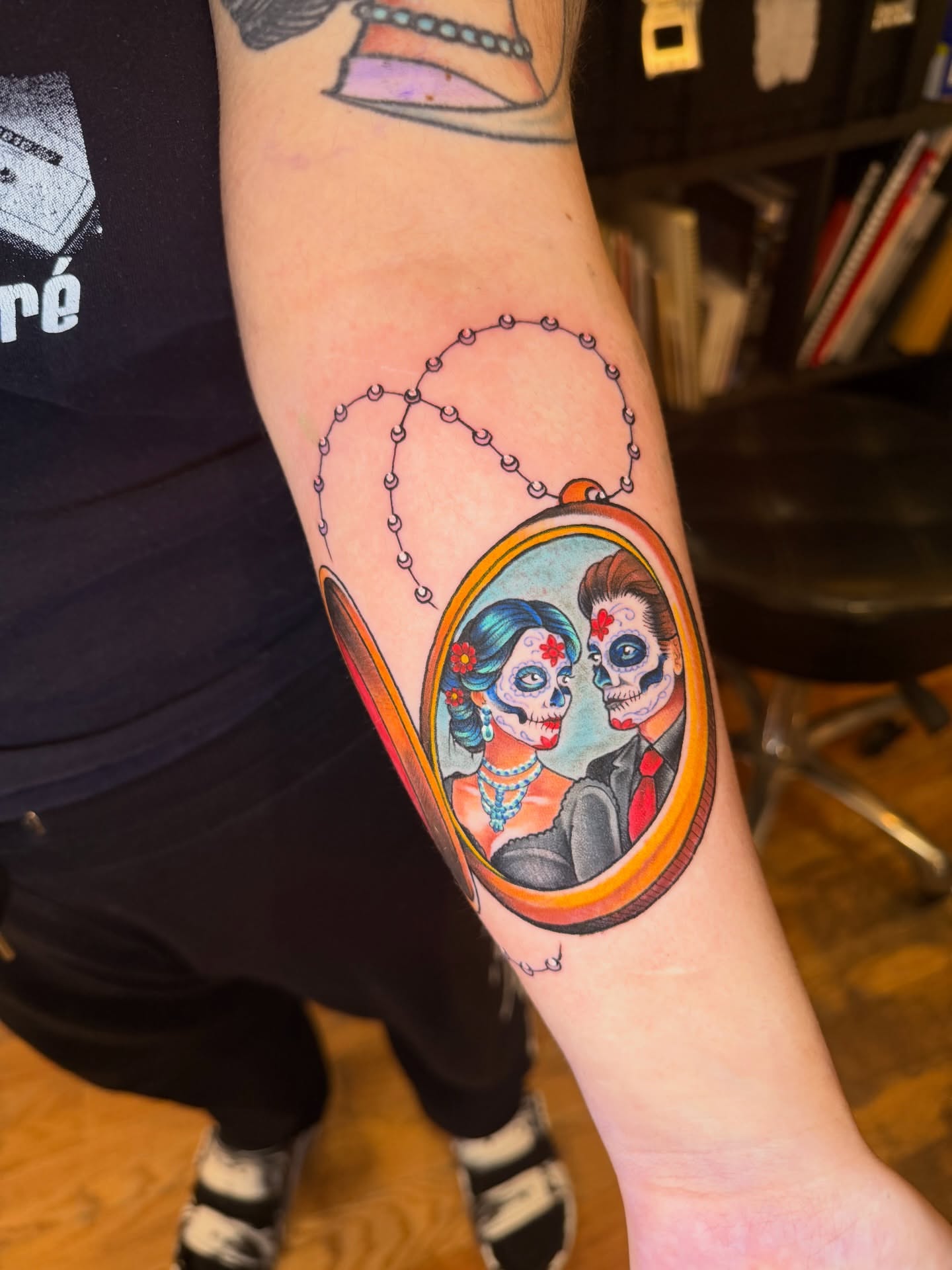 Dia de los Muertos couple American traditional tattoo on the forearm by Kevin R. Onley