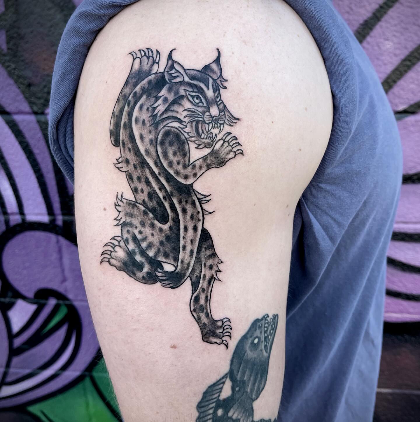 Lynx black and grey tattoo on the thigh by Ashly Hutchens, Richmond, Virginia