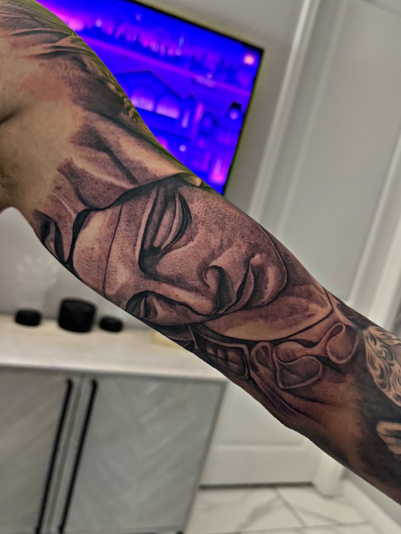 Mask realism tattoo on the forearm by Adrian gonzalez...