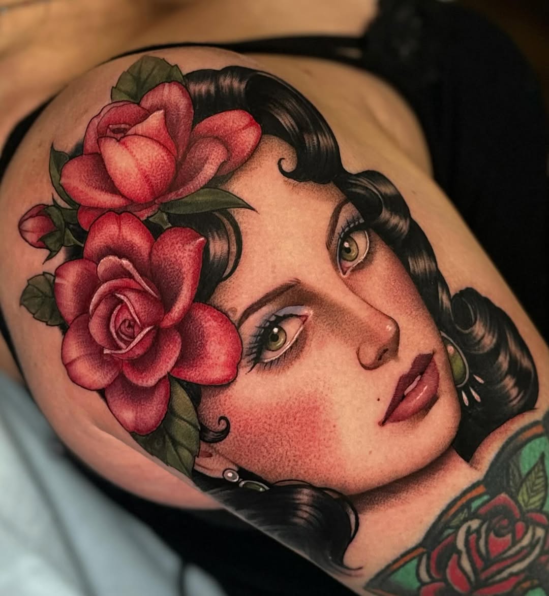 Woman's face with roses neo-traditional tattoo on the shoulder by Luna Lucero