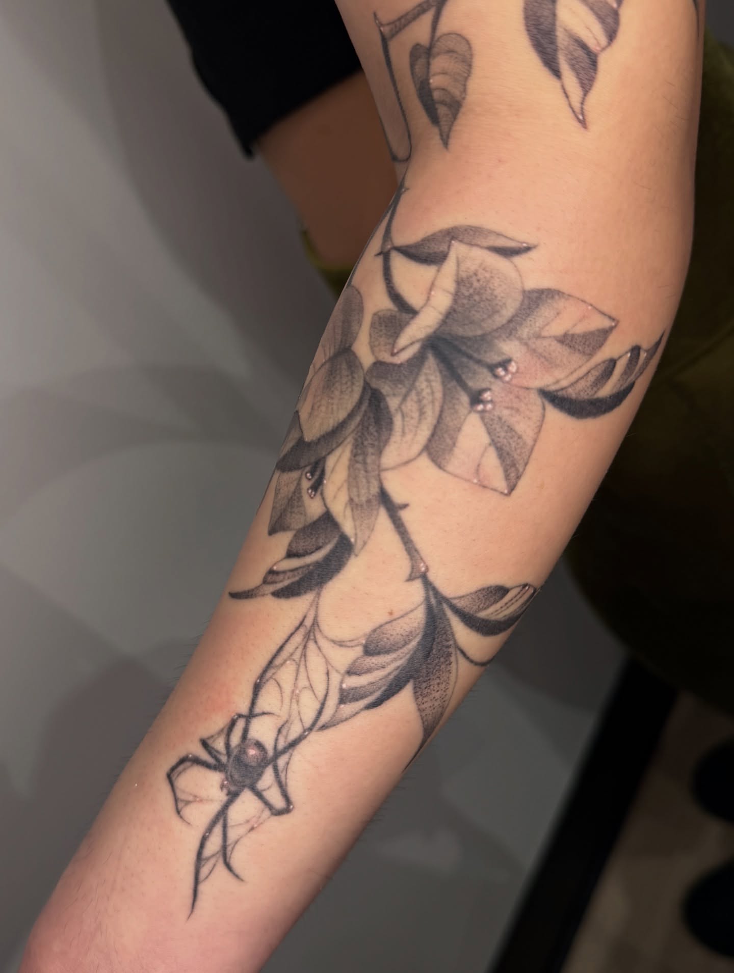 Spider and leaves dotwork tattoo on the forearm by ✮shayla ganong✮