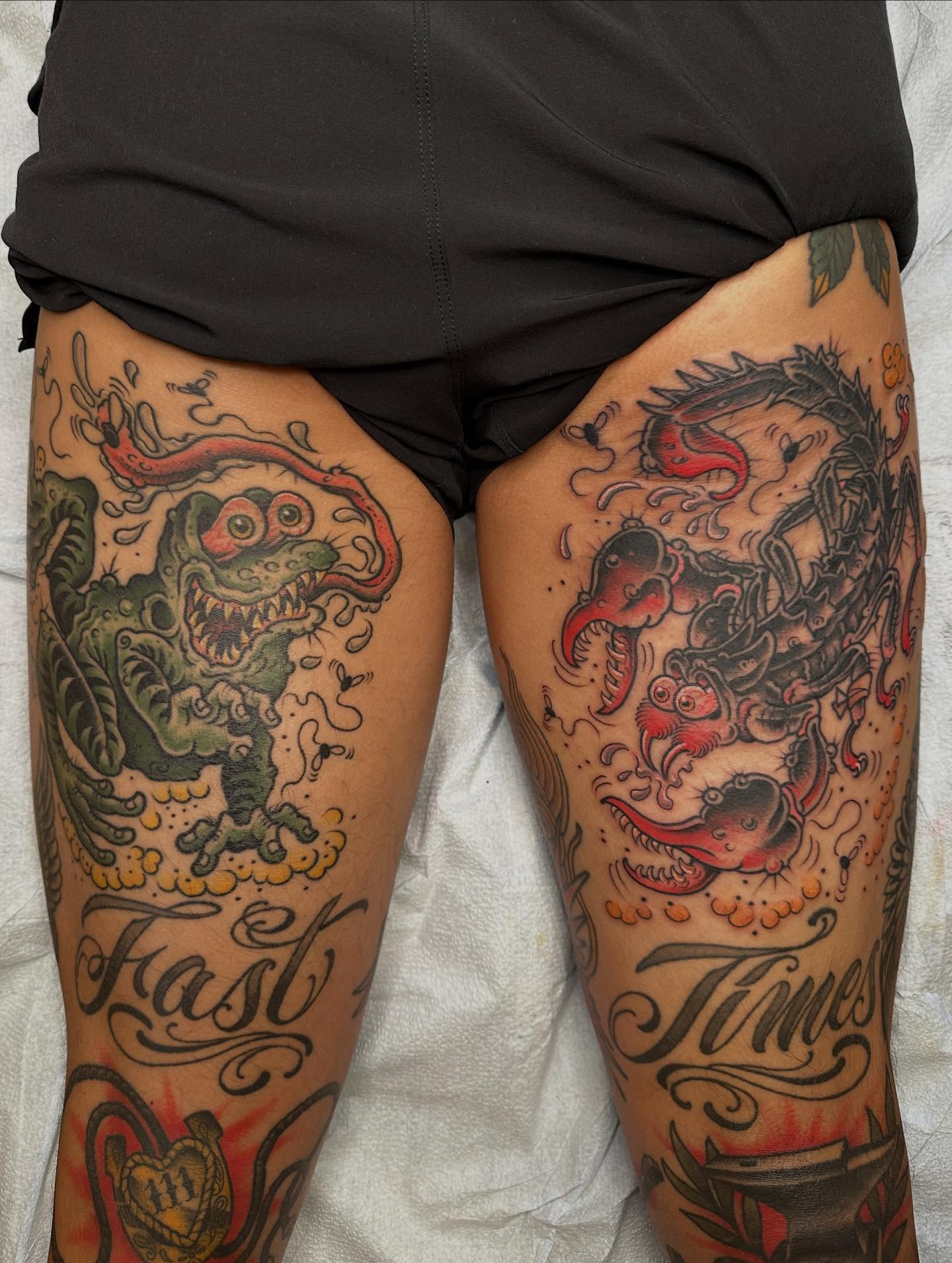 Demon and dragon American traditional tattoo on the thigh by Megon Shore, Seattle, Washington