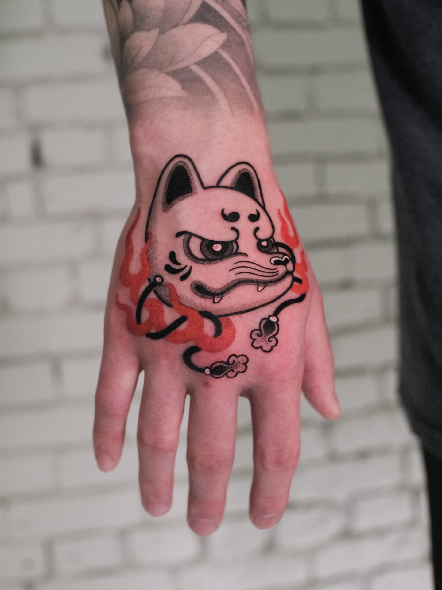 Cat japanese irezumi tattoo on the hand by seattle tattoo artist