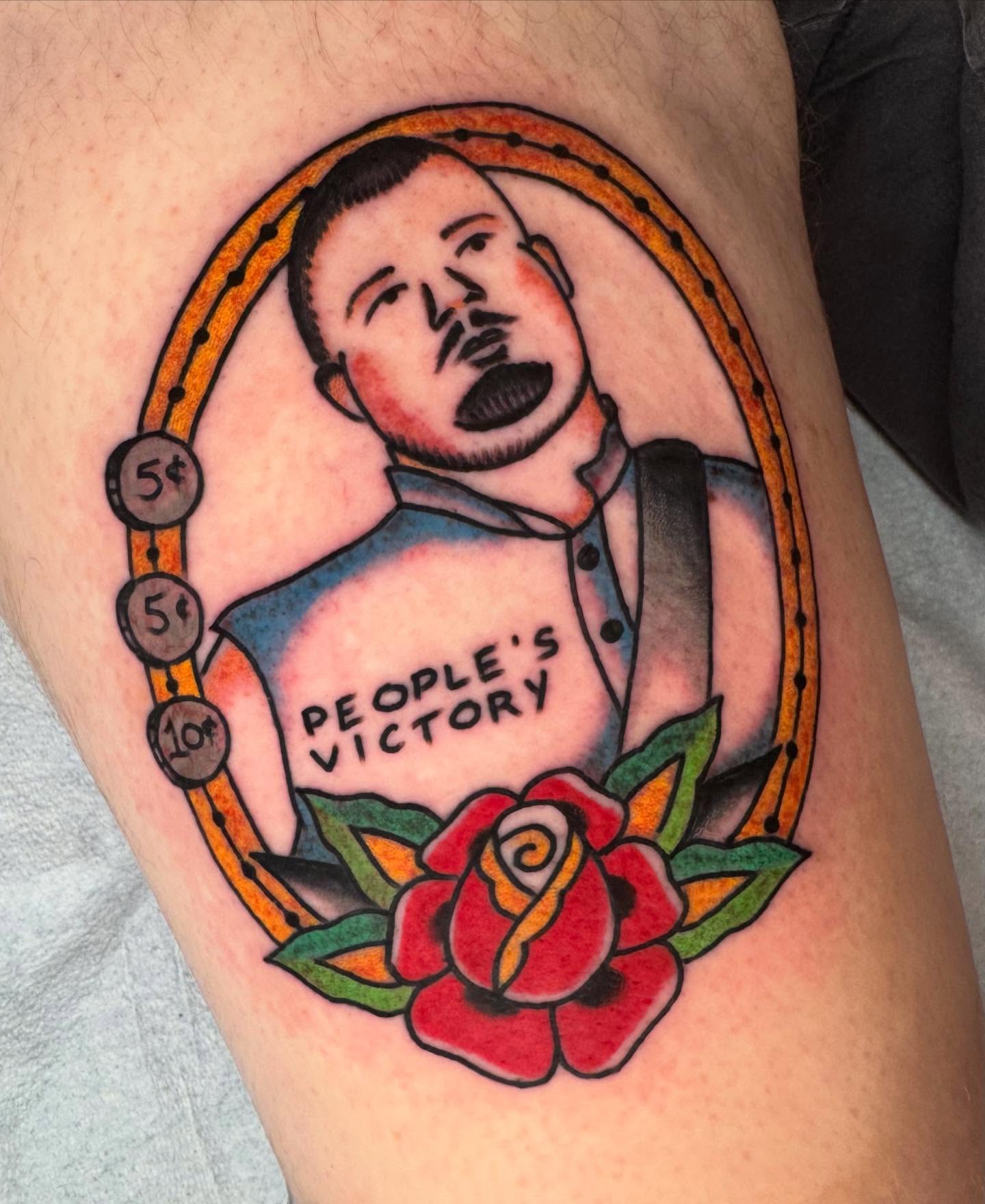 People's victory American traditional tattoo on the thigh by JoJo Benton