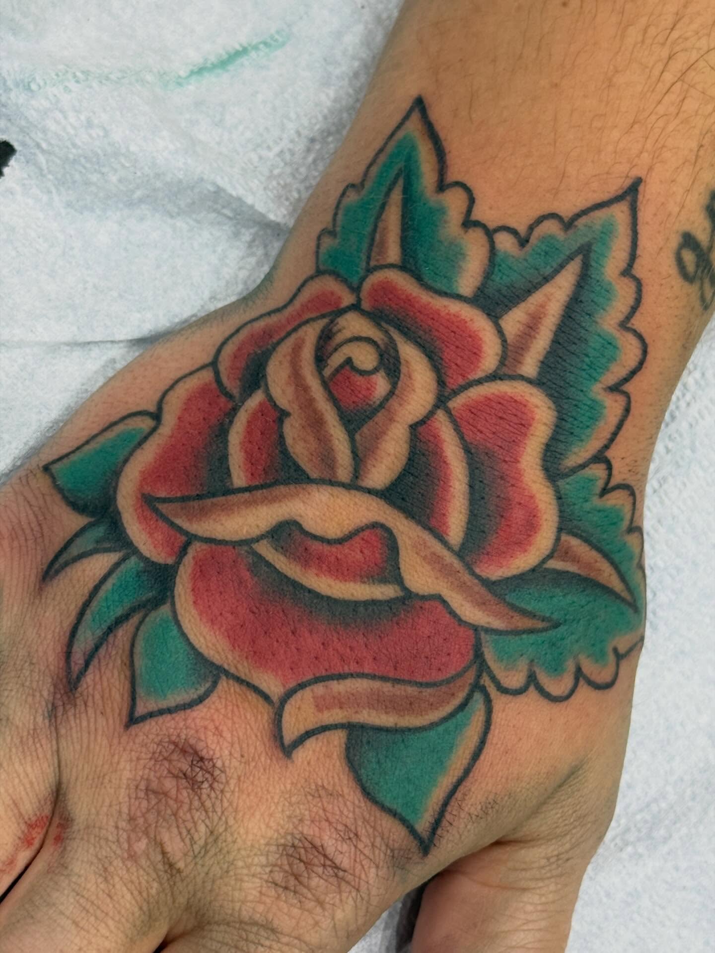 Rose American traditional tattoo on the forearm by Austin Liebst, Wichita, Kansas