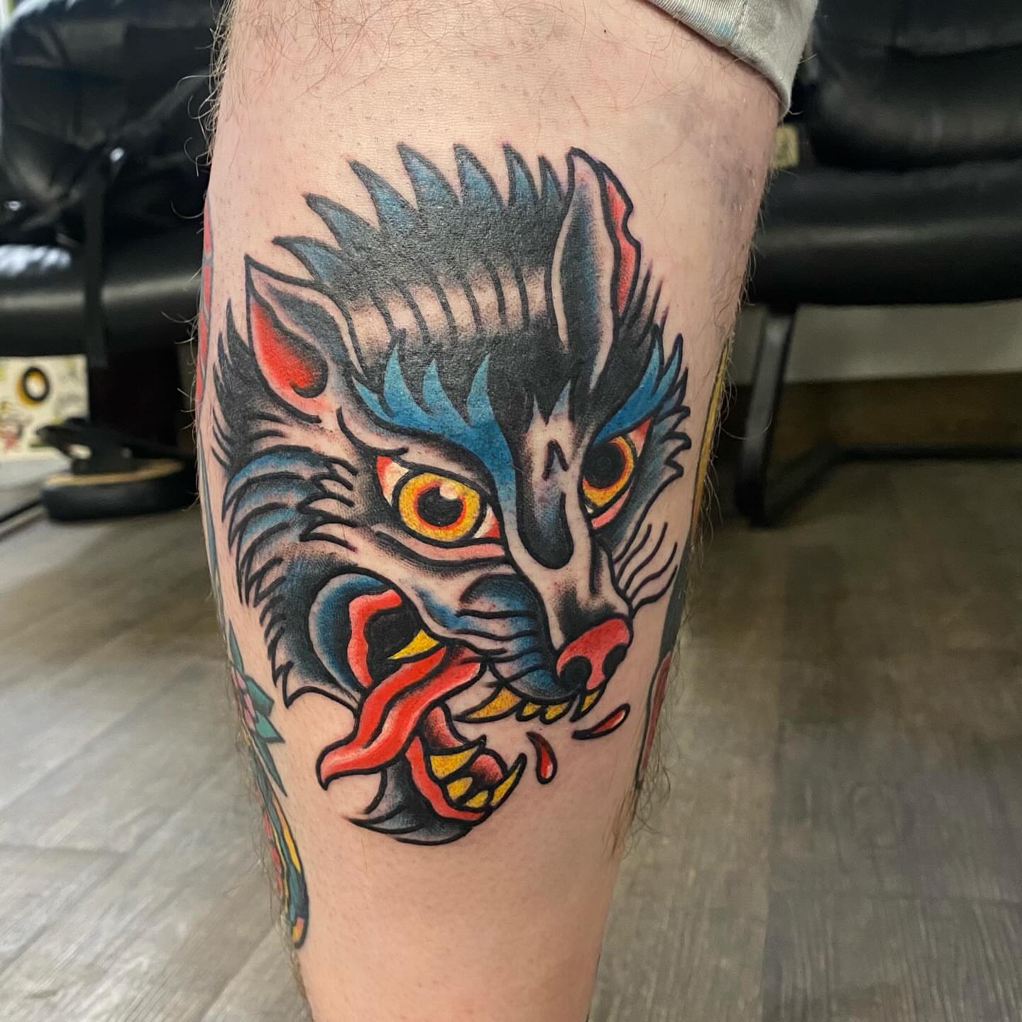 Wolf head American traditional tattoo on the thigh by Las Vegas Tattoo Artist
