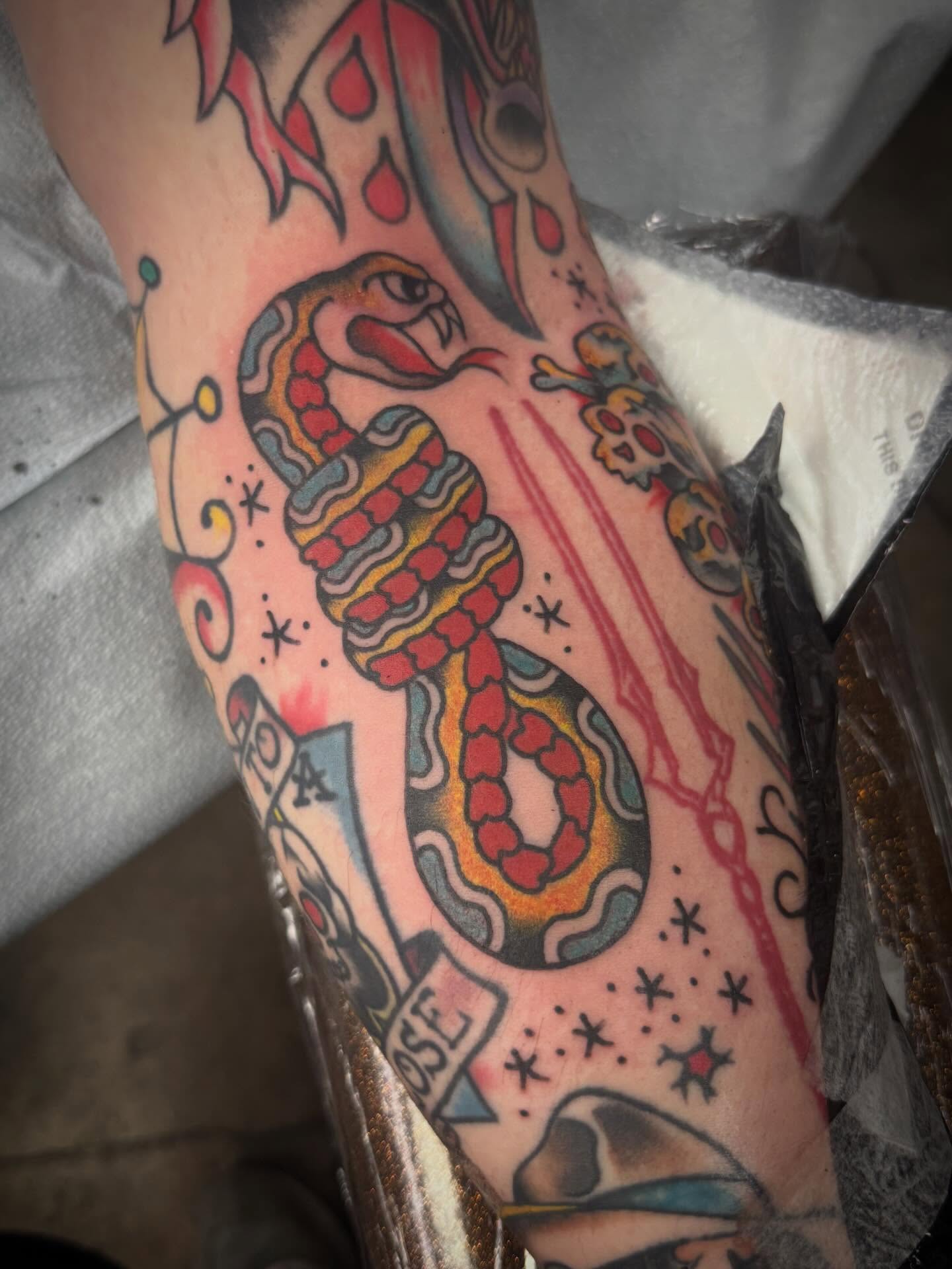 Snake American traditional tattoo on the forearm by Austin Liebst, Wichita, Kansas