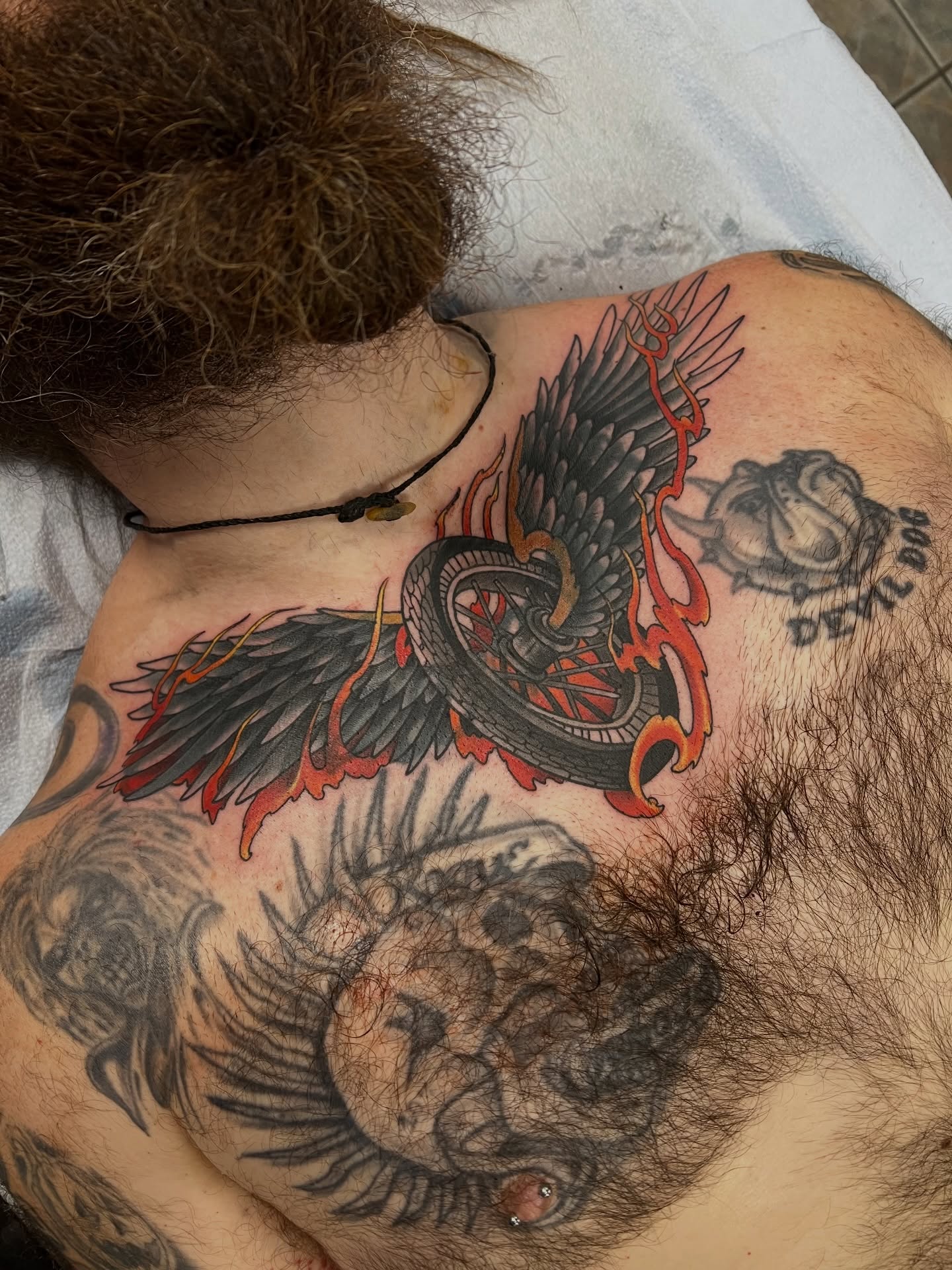 Winged snake American traditional tattoo on the chest by Corey Thompson, Butler, Pennsylvania