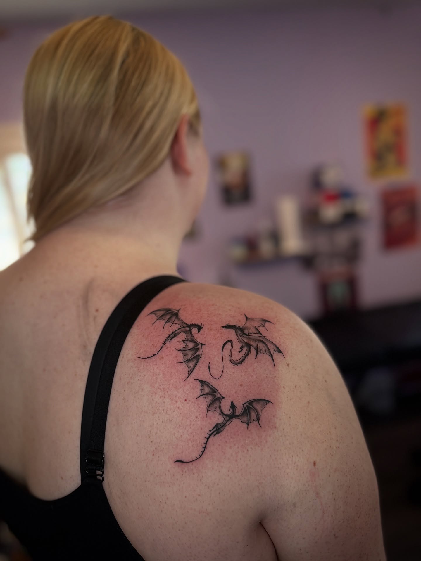 Dragons black and grey tattoo on the shoulder by Honey