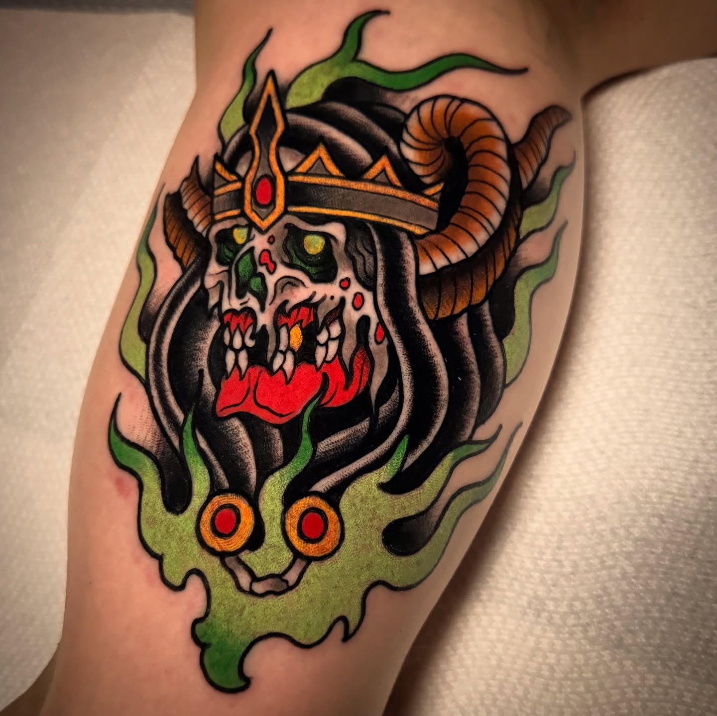 Demon skull American traditional tattoo on the thigh by K y l e   M a c K e n z i e, Salem, Massachusetts