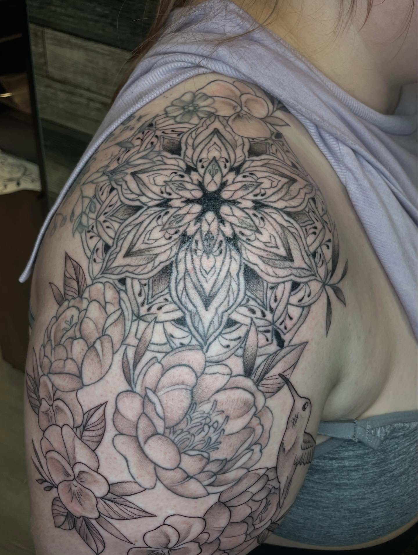 Floral mandala geometric tattoo on the shoulder by Stevie Timmreck, Utica, Michigan