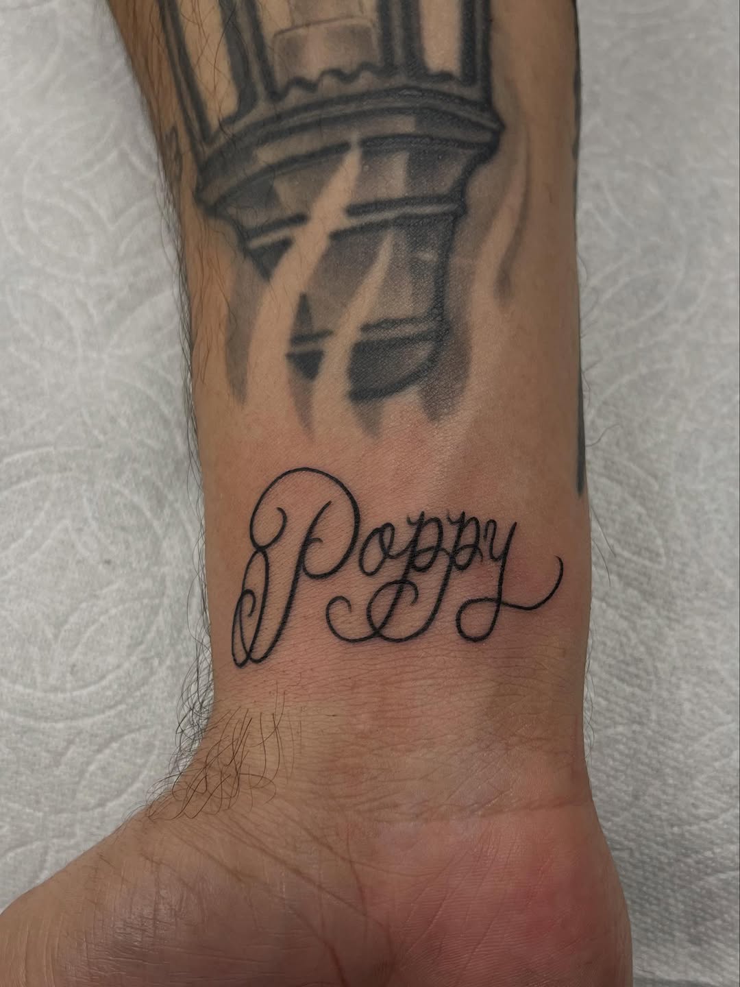 Tattoo by @valadeztattoo — lettering_script, black_and_grey