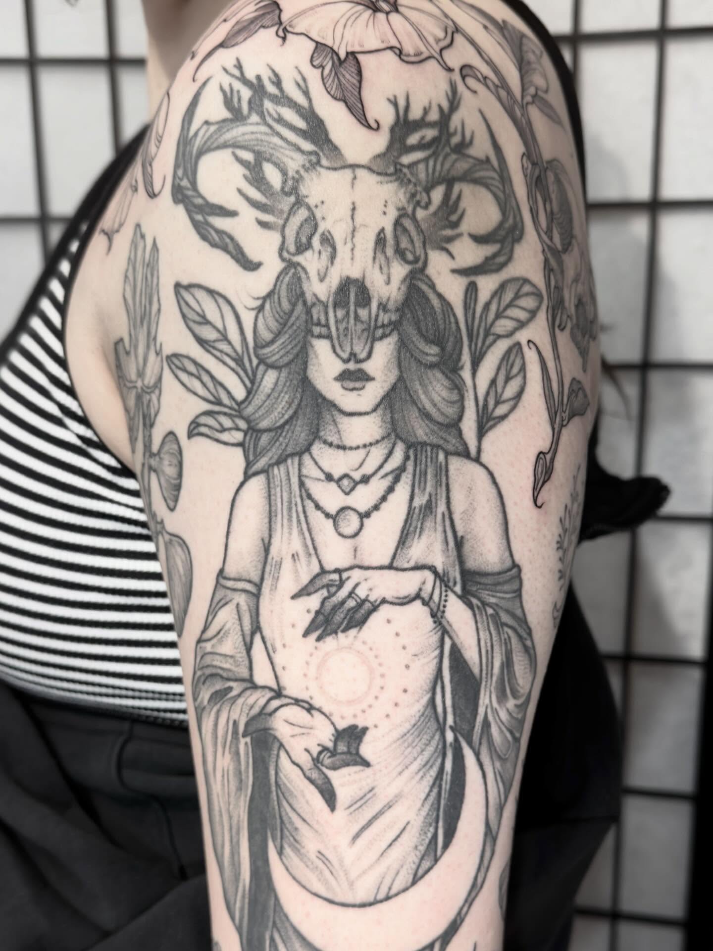 Gothic woman with deer skull dark realism tattoo on the shoulder by Kirsten Marsden Ballantyne